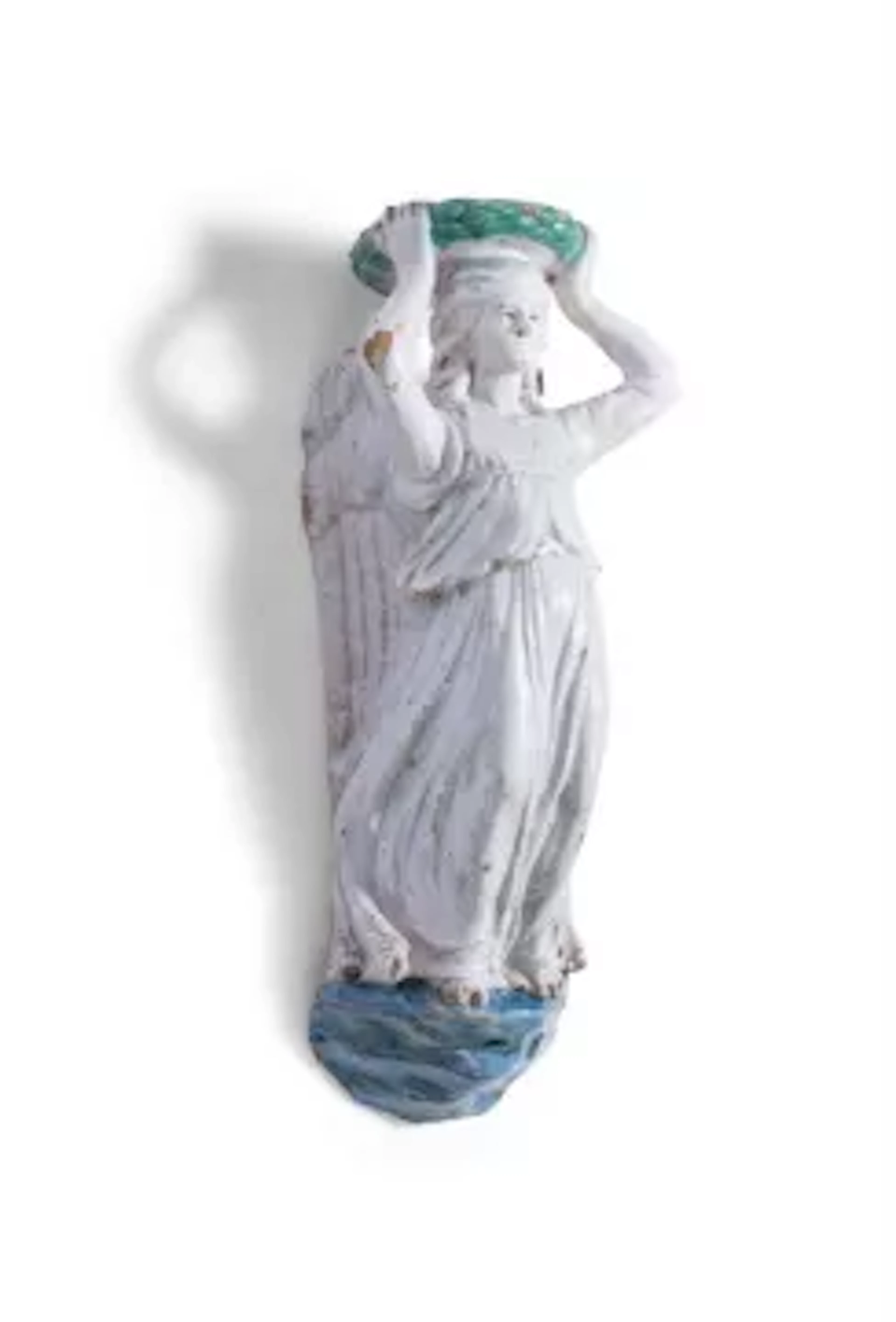 A MAIOLICA WALL FITTING IN DELLA ROBBIA STYLE AND MODELLED AS A WINGED