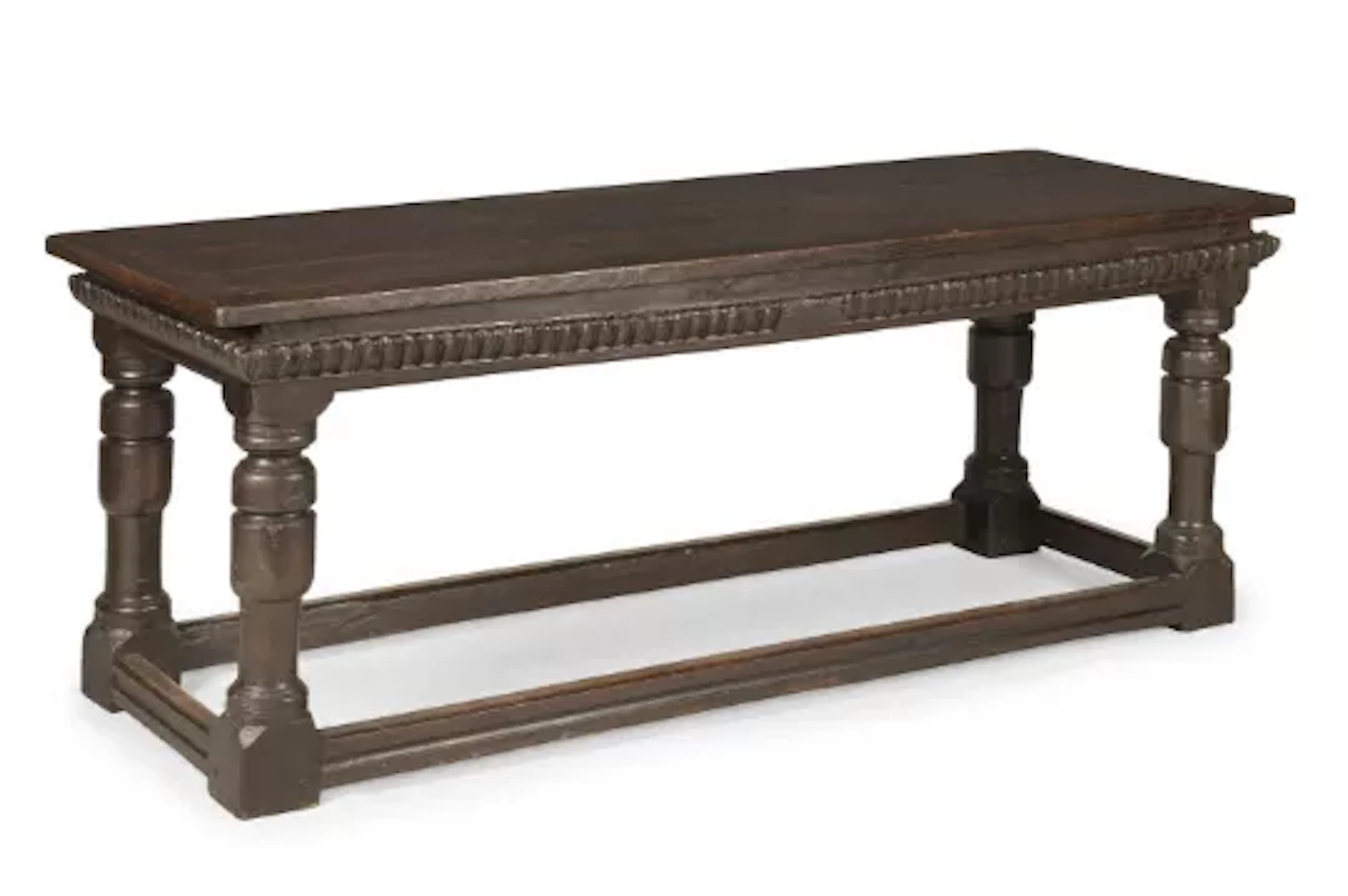 AN ELIZABETH I OAK REFECTORY TABLE, CIRCA 1600