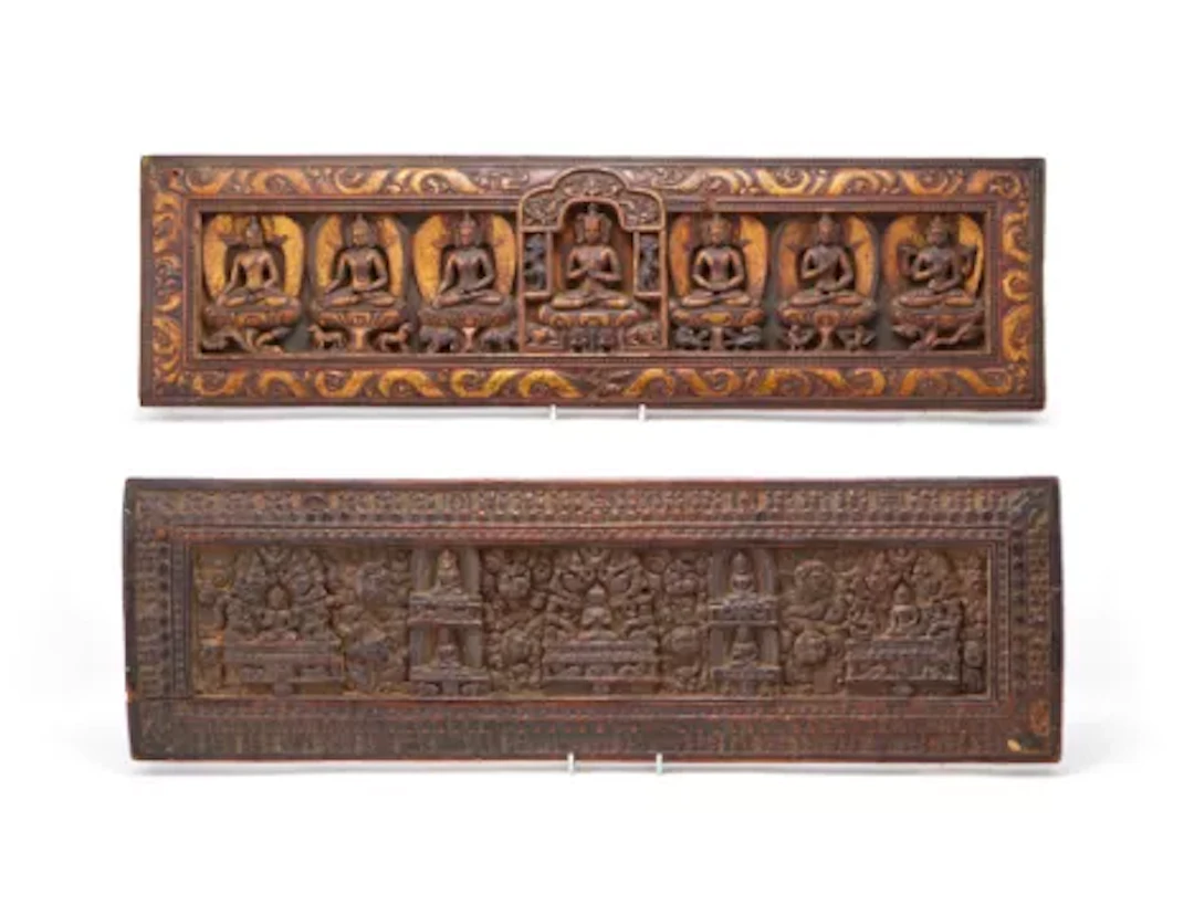 A Tibetan gilt lacquered wood manuscript cover, 16th century