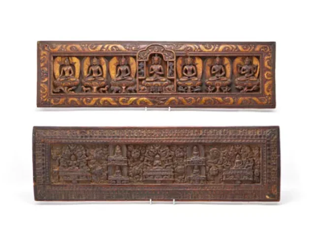 A Tibetan gilt lacquered wood manuscript cover, 16th century