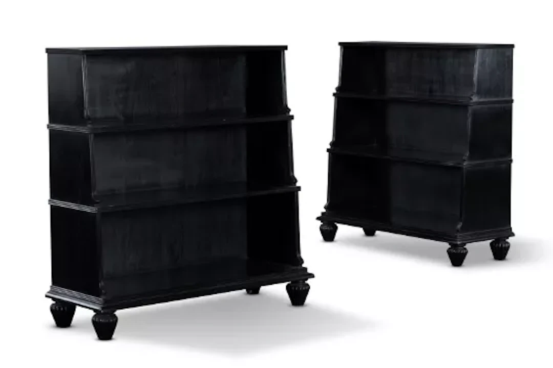 A PAIR OF EBONISED HARDWOOD 'WATERFALL' OPEN BOOKCASES, INDIAN, MODERN