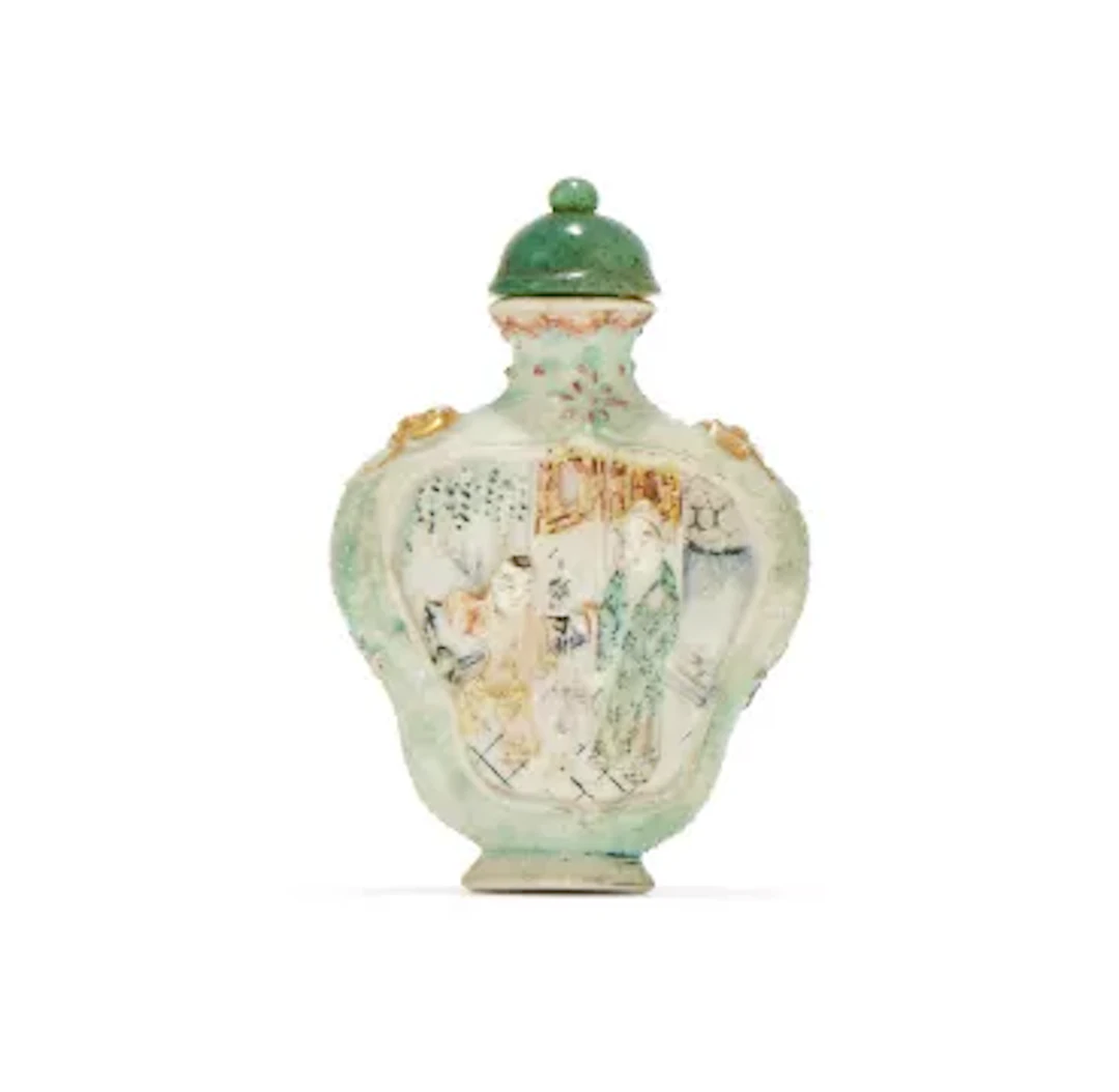 A Chinese moulded famille rose 'Romance of the Western Chamber' snuff