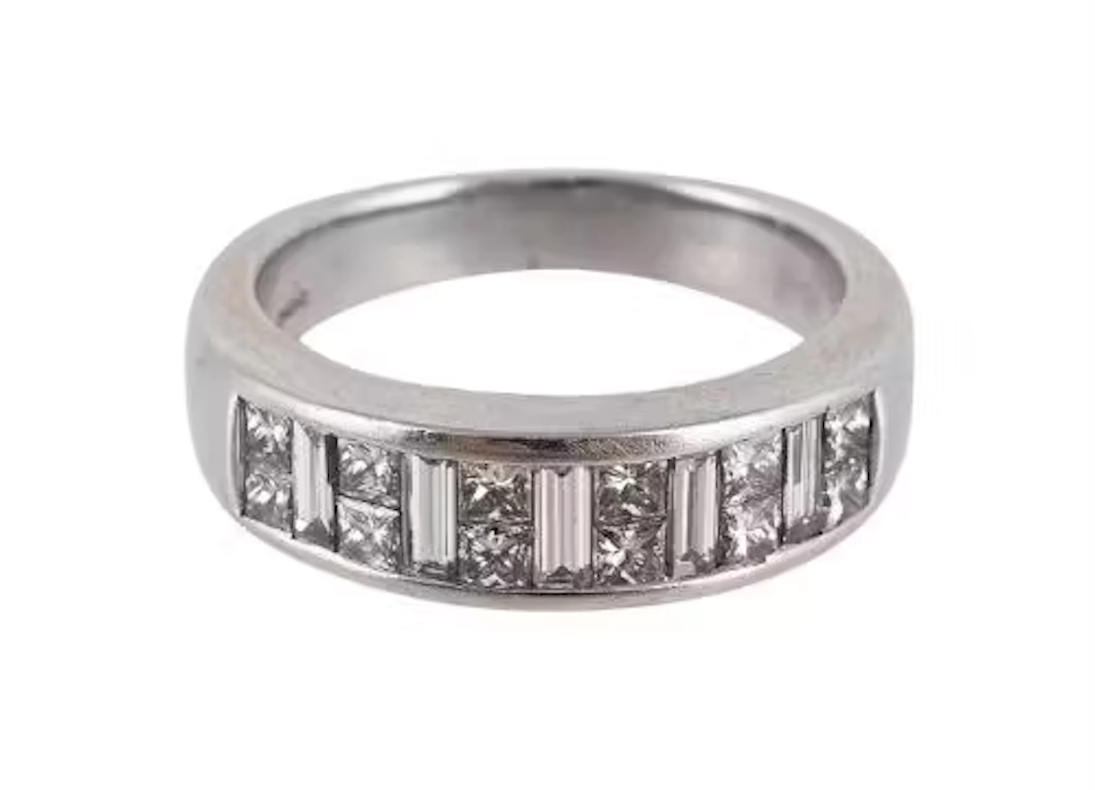A DIAMOND HALF ETERNITY RING