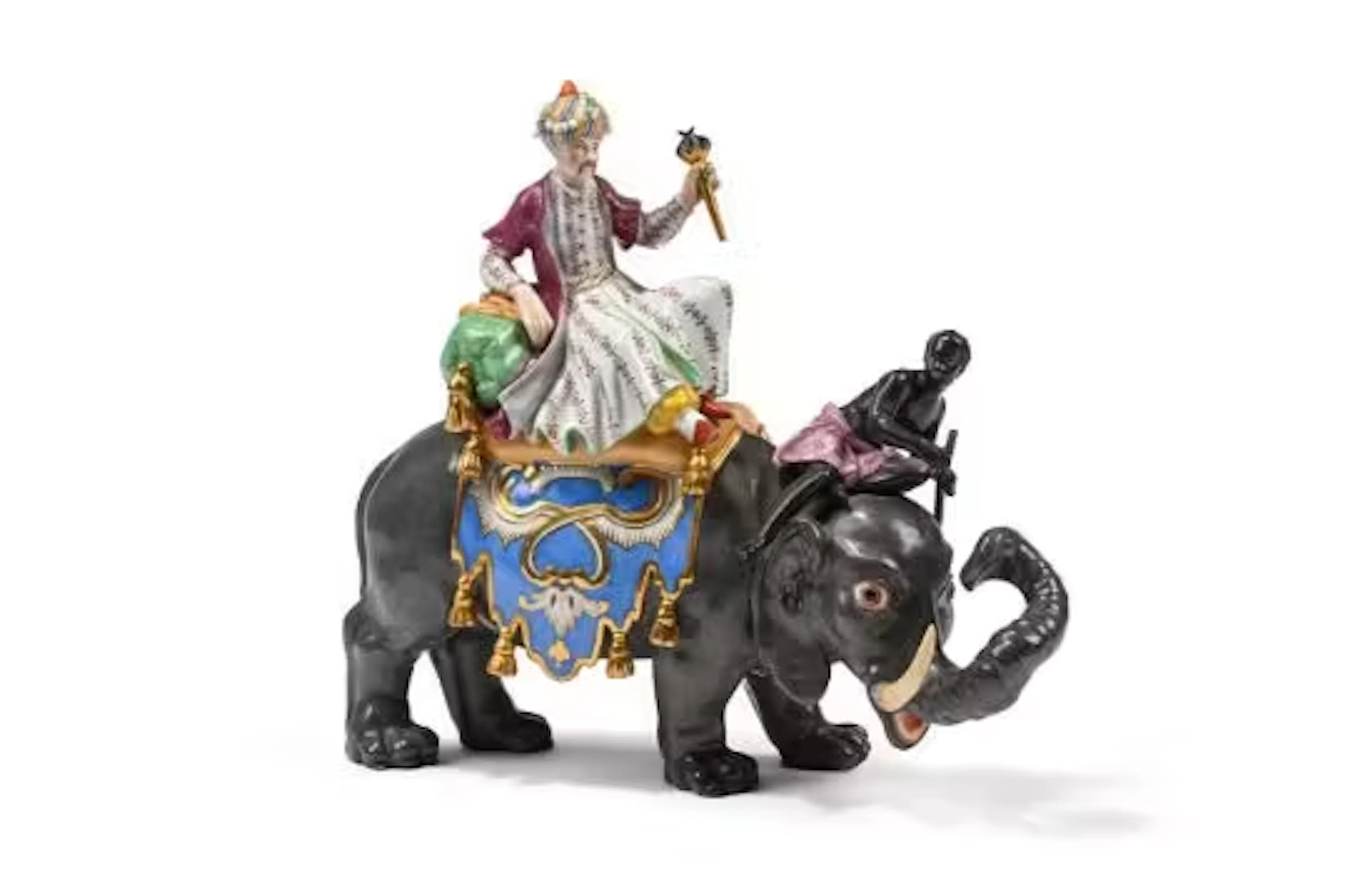A DRESDEN PORCELAIN MODEL OF A CAPARISONNED ELEPHANT, AFTER THE MEISSEN