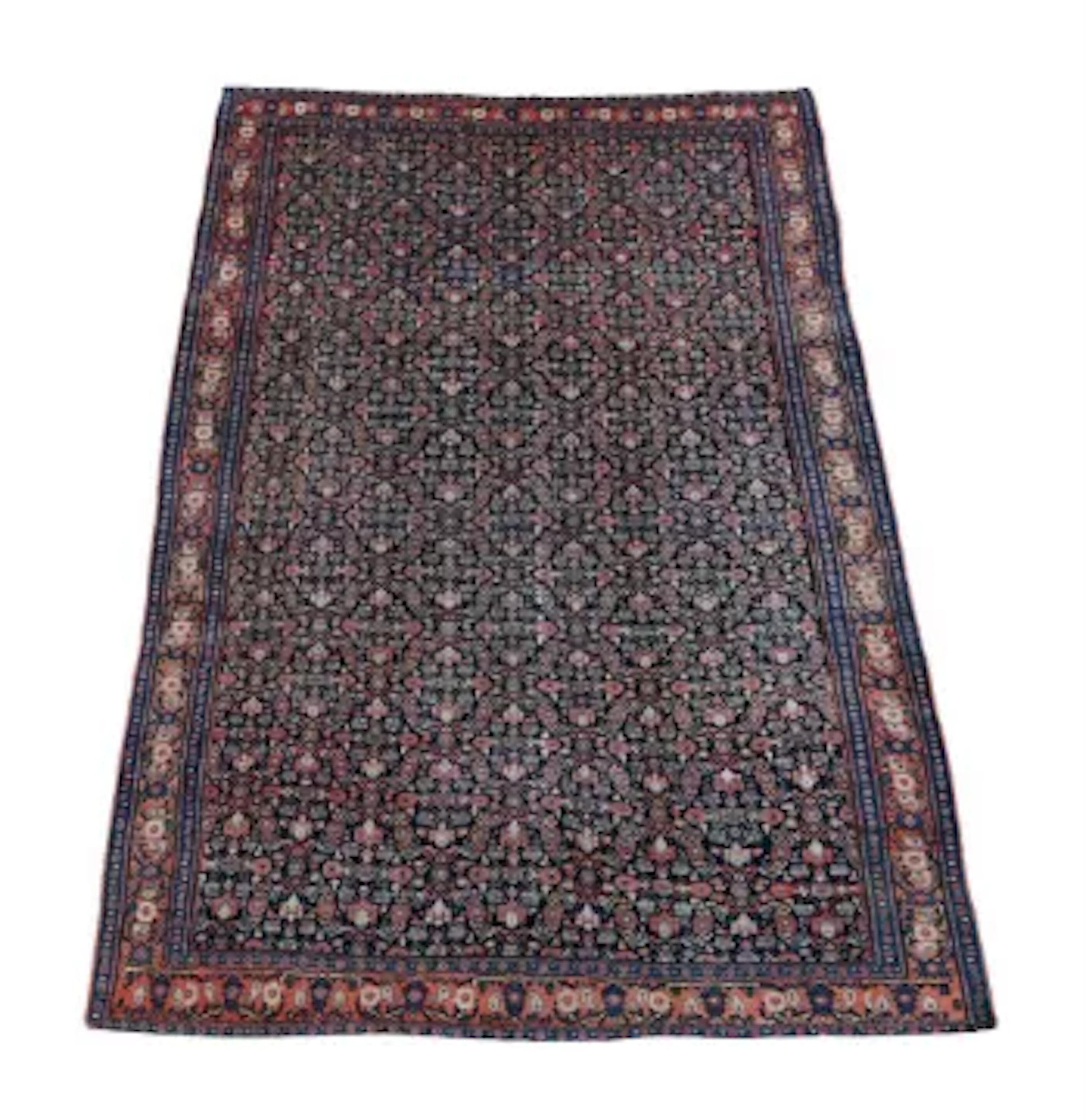 A PERSIAN FERAGHAN CARPET