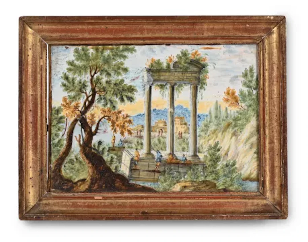 A CASTELLI POLYCHROME RECTANGULAR PLAQUE DEPICTING RUINS IN A LANDSCAPE