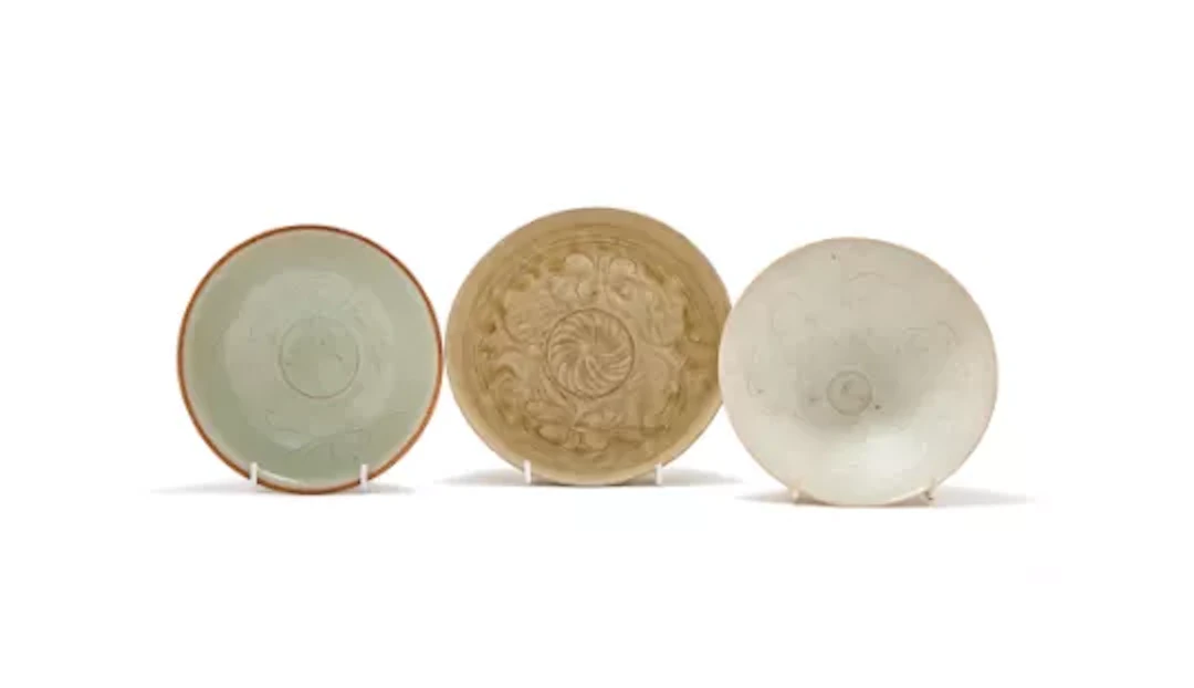 A Chinese incised celadon bowl, Late Northern or early Southern Song