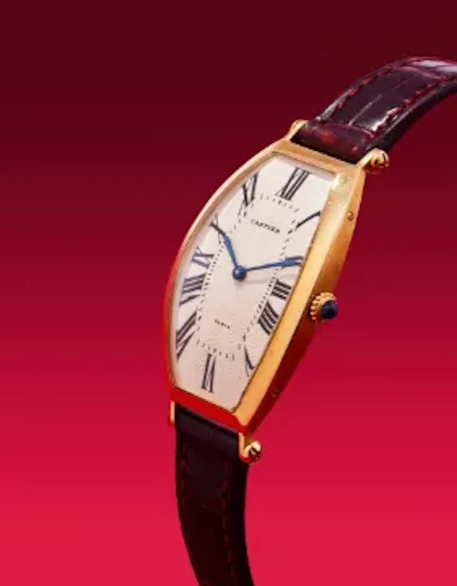 Y CARTIER, TONNEAU, A GOLD WRISTWATCH