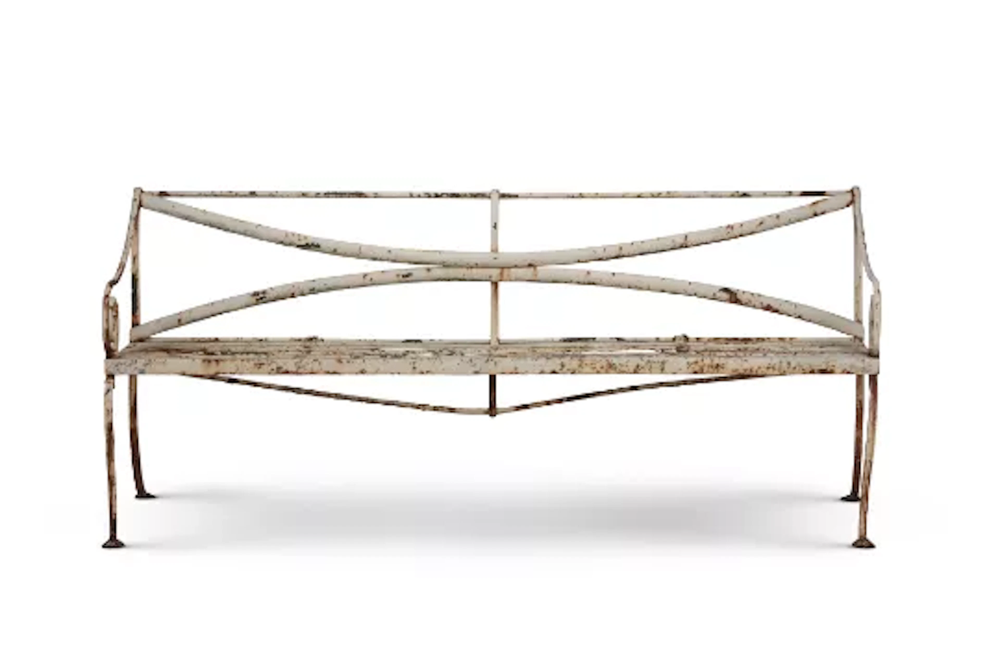 A WHITE PAINTED WROUGHT IRON GARDEN BENCH IN THE REGENCY STYLE, EARLY