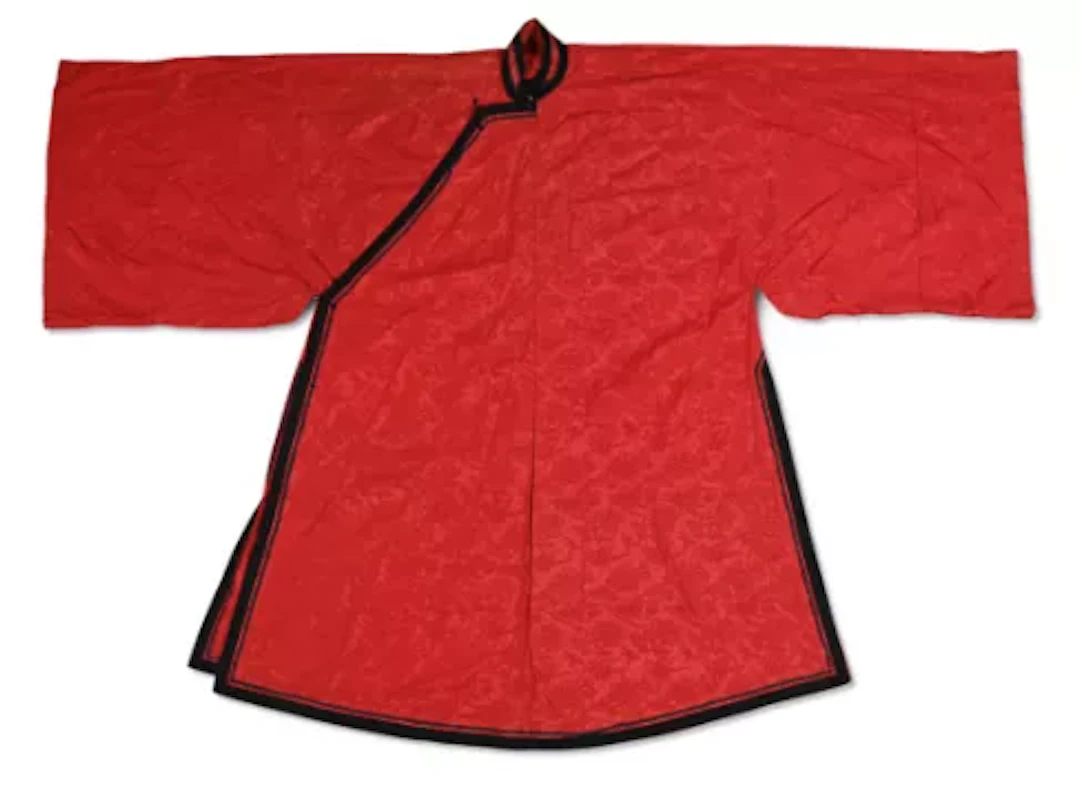 A Chinese women’s bright red side-fastening silk damask summer robe