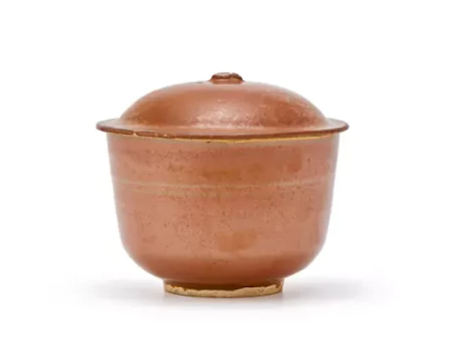 A Chinese Cizhou persimmon-glazed bowl and cover, Northern Song or