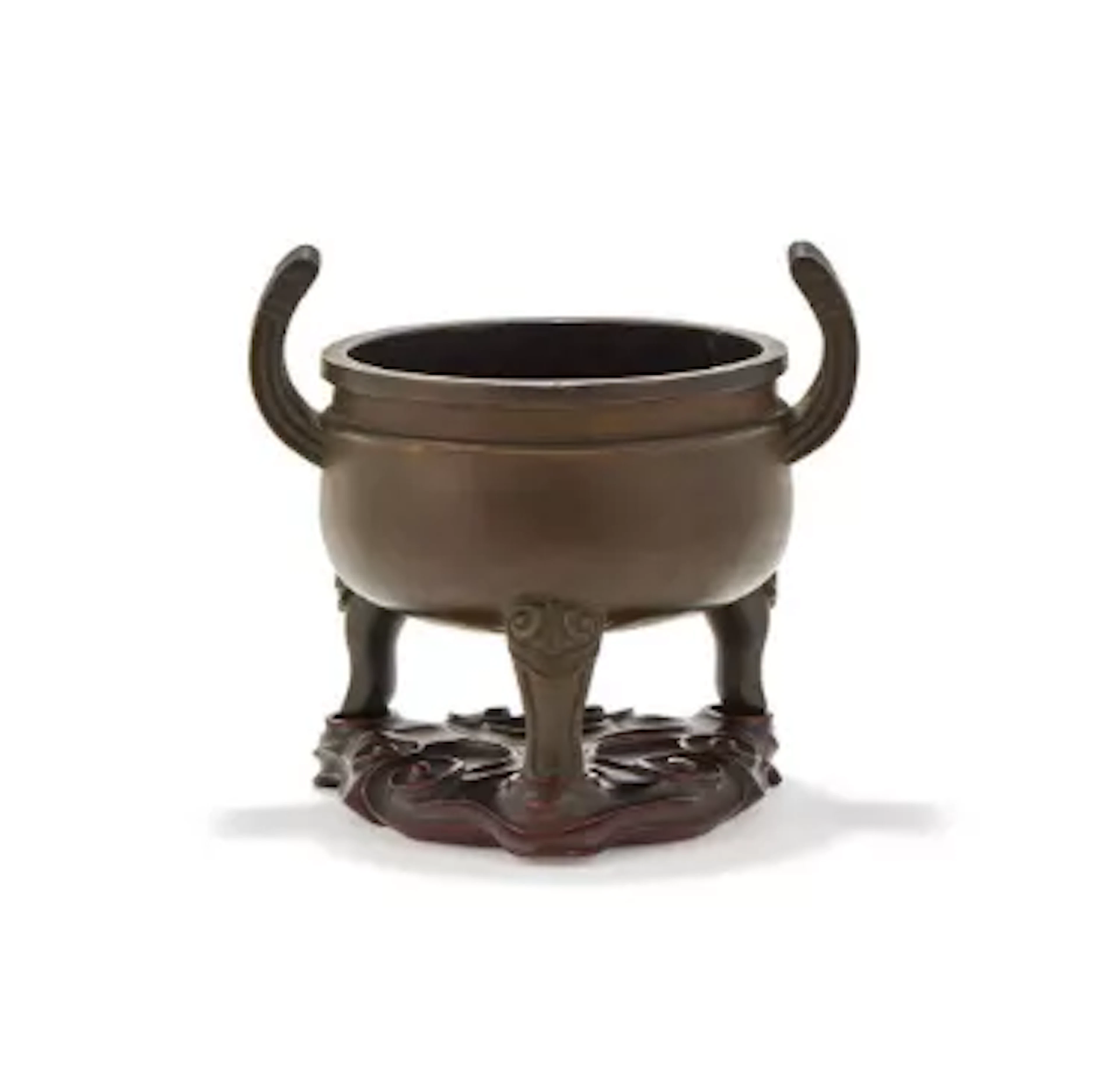 A Chinese bronze tripod censer
