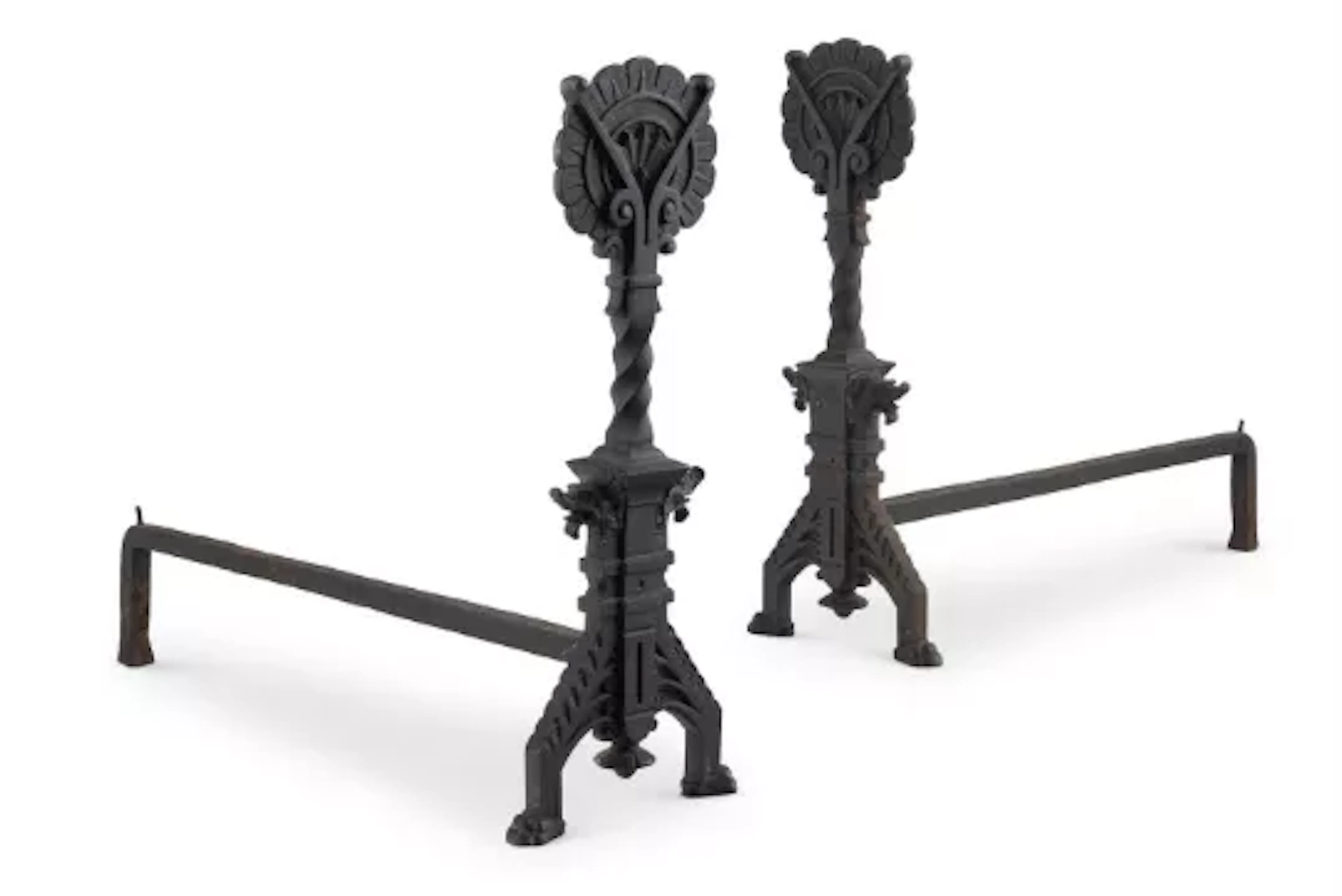 A PAIR OF AESTHETIC MOVEMENT CAST IRON FIRE DOGS, CIRCA 1890