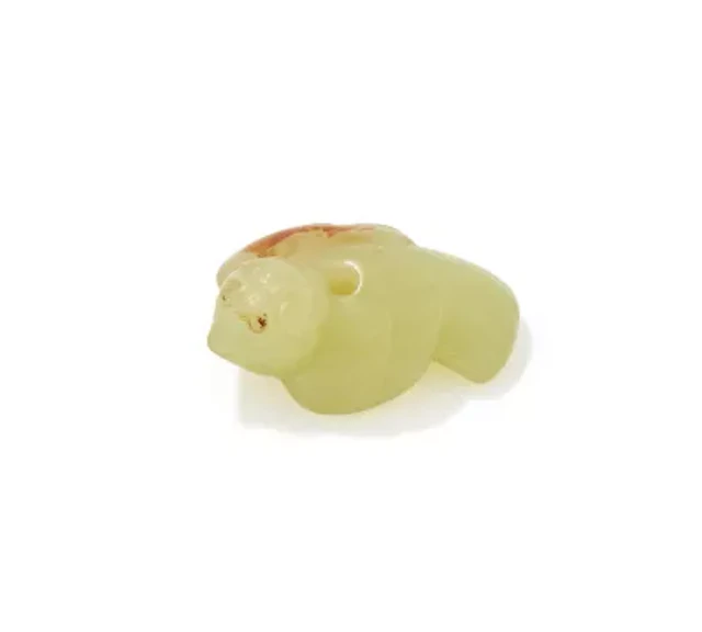 A Chinese yellow jade 'Bird' pendant, Qing Dynasty or earlier