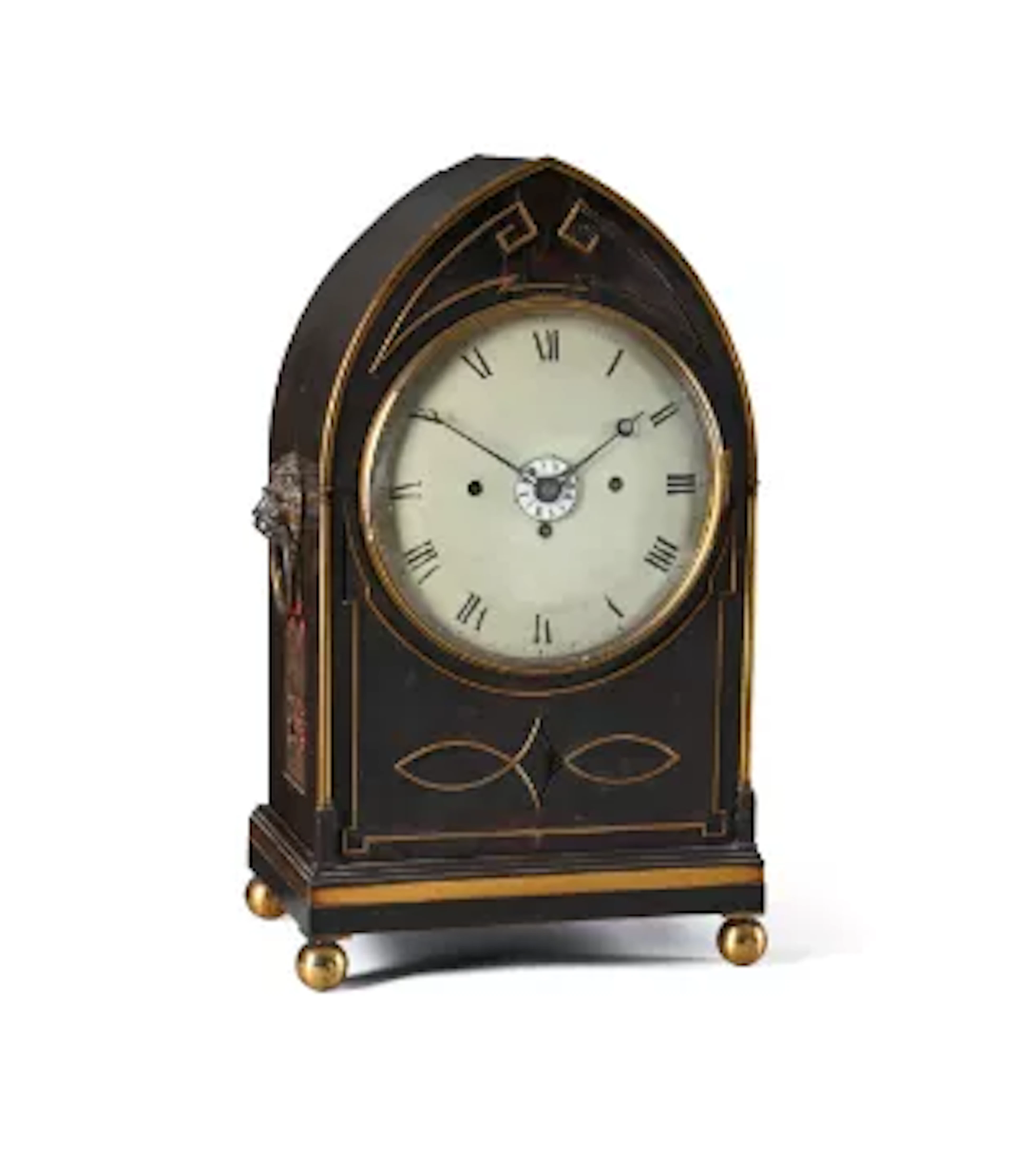 A REGENCY BRASS MOUNTED EBONISED LANCET-SHAPED QUARTER-STRIKING BRACKET