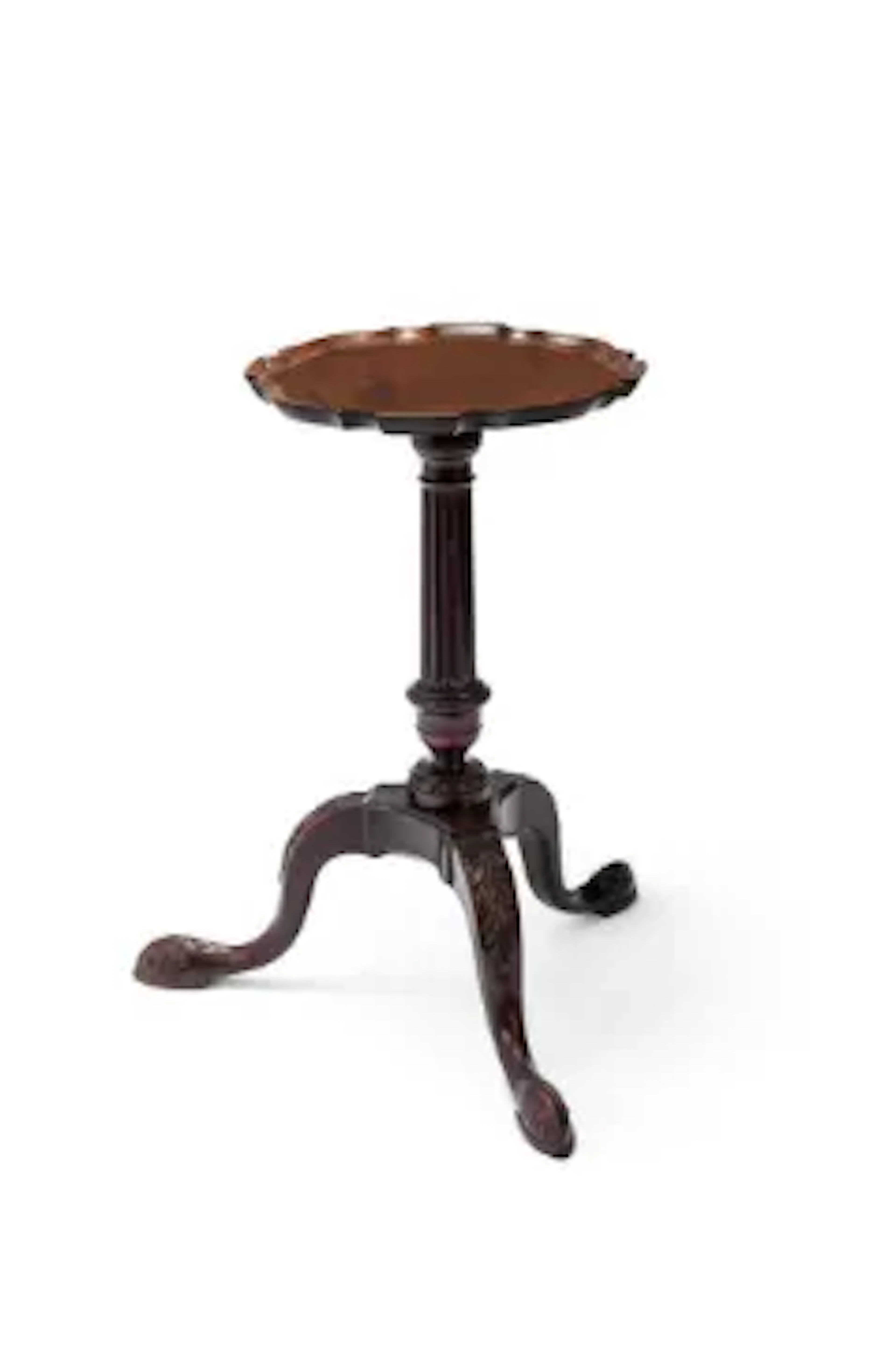 A GEORGE II MAHOGANY PIECRUST CANDLE STAND, IN THE MANNER OF THOMAS