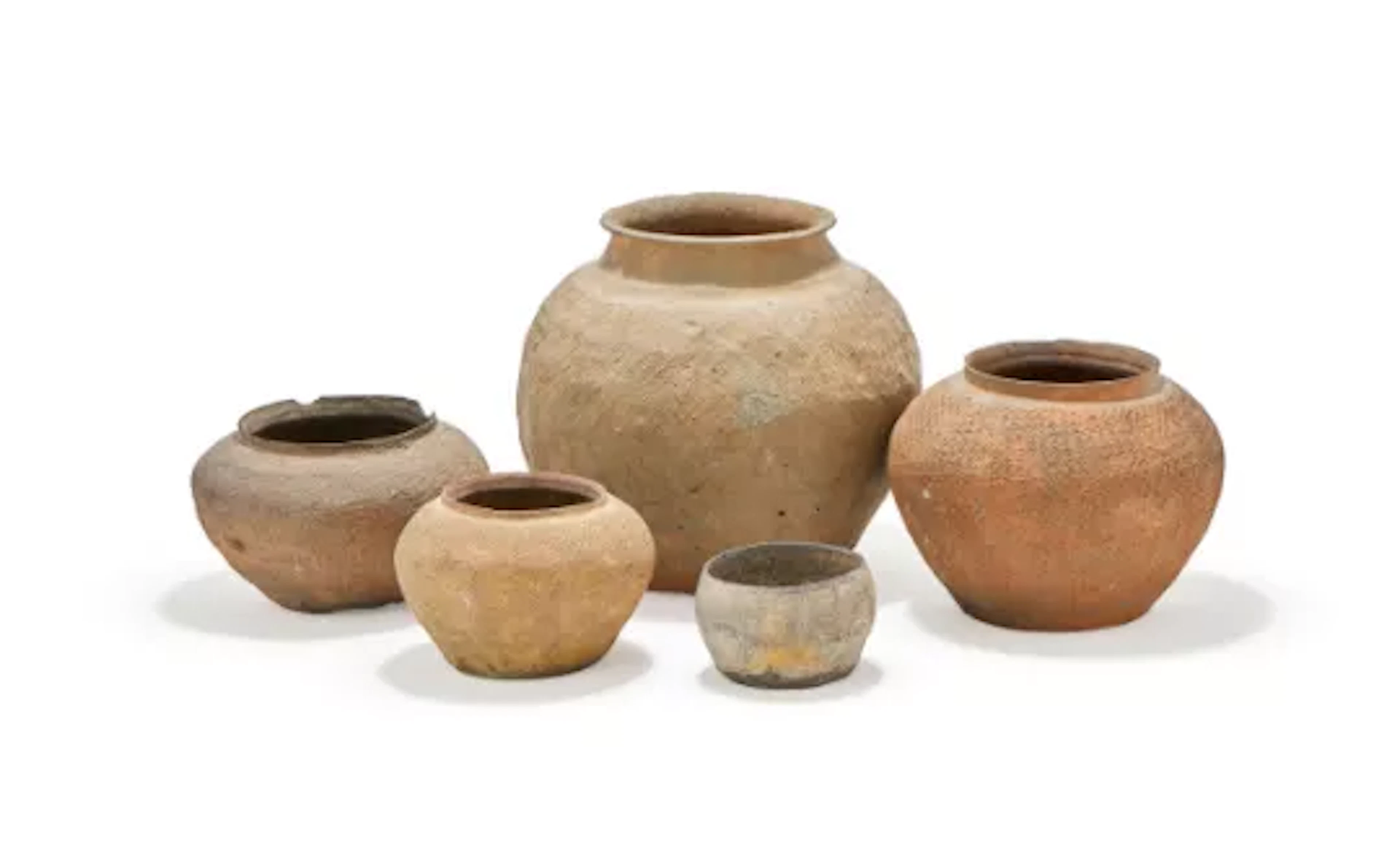 Five various moulded pottery vessels, Warring States, (475-221 BC)