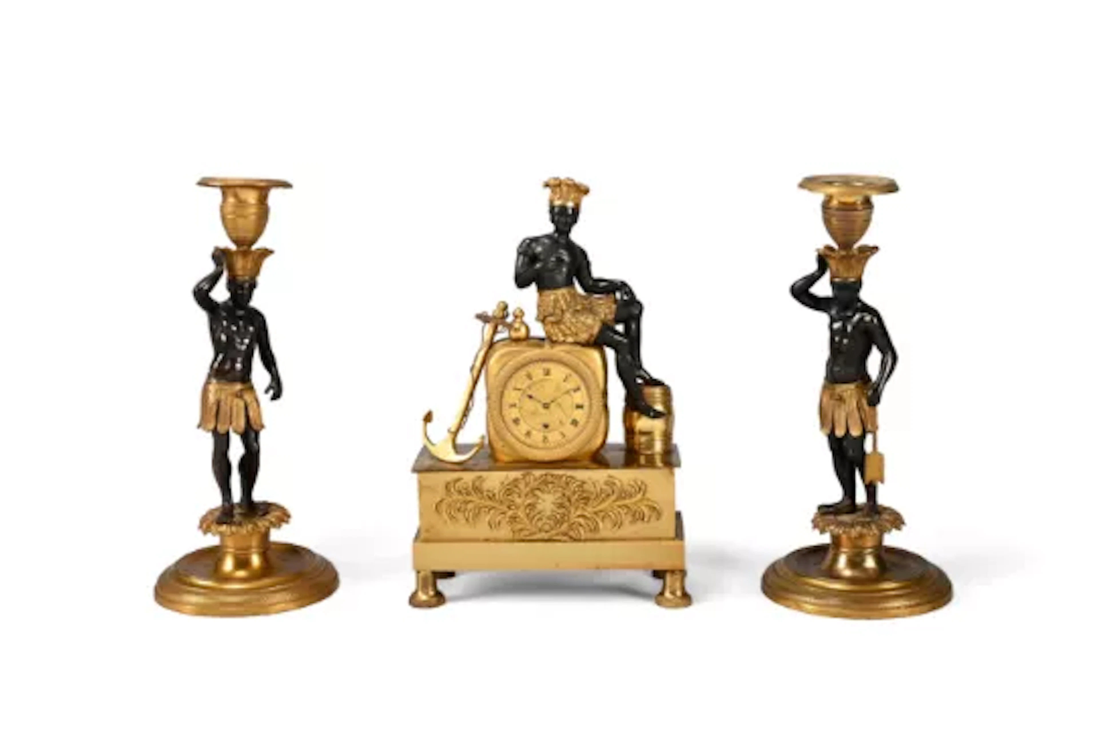 A RARE FRENCH EMPIRE GILT BRONZE MINIATURE MANTEL TIMEPIECE EMBLEMATIC