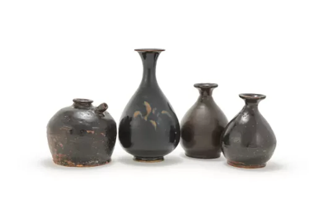 A group of four Chinese Henan black glazed vases, Yuan dynasty and later