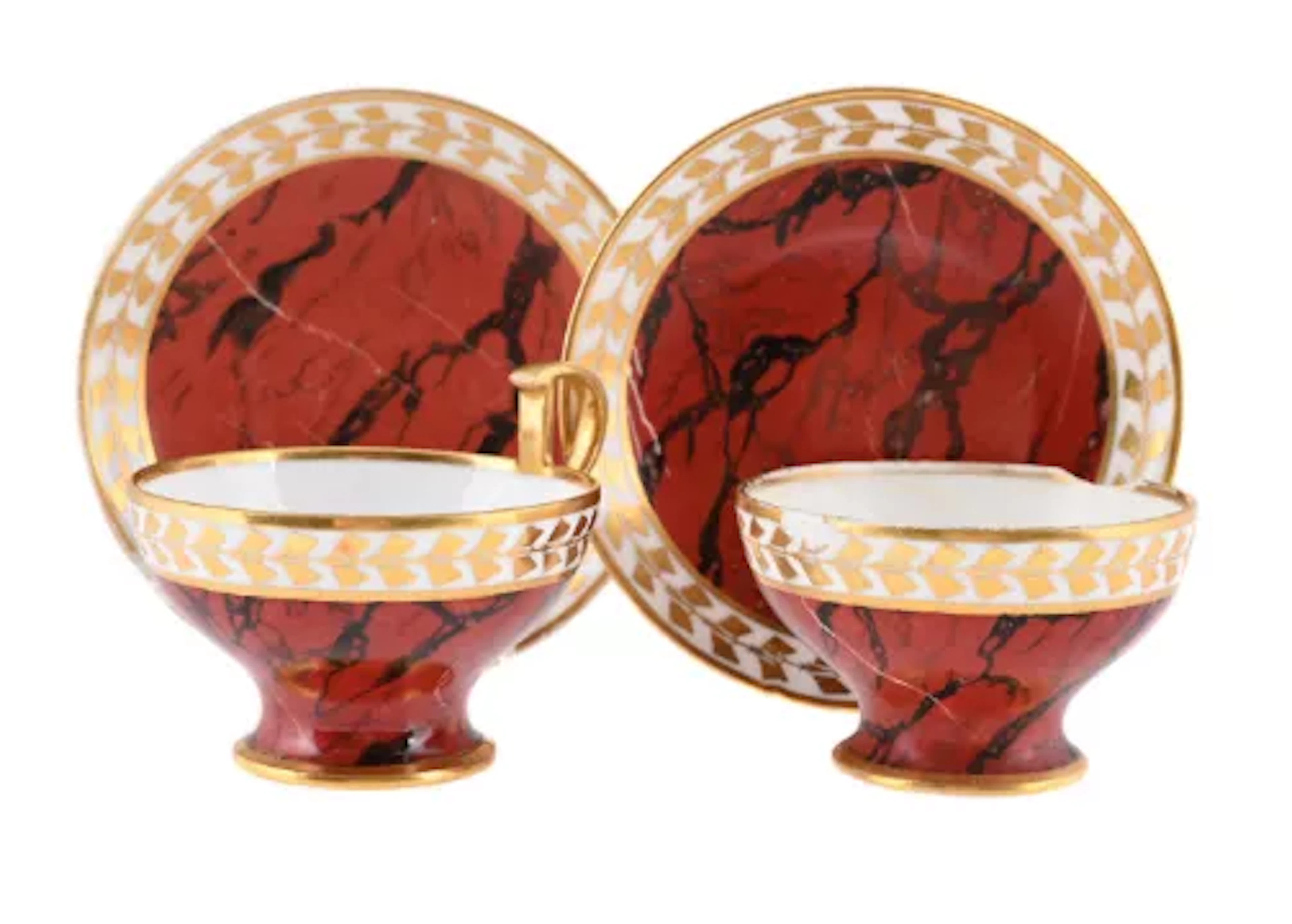 A SÈVRES (HARD PASTE) PORCELAIN FIRST EMPIRE TEACUP AND SAUCER, EARLY