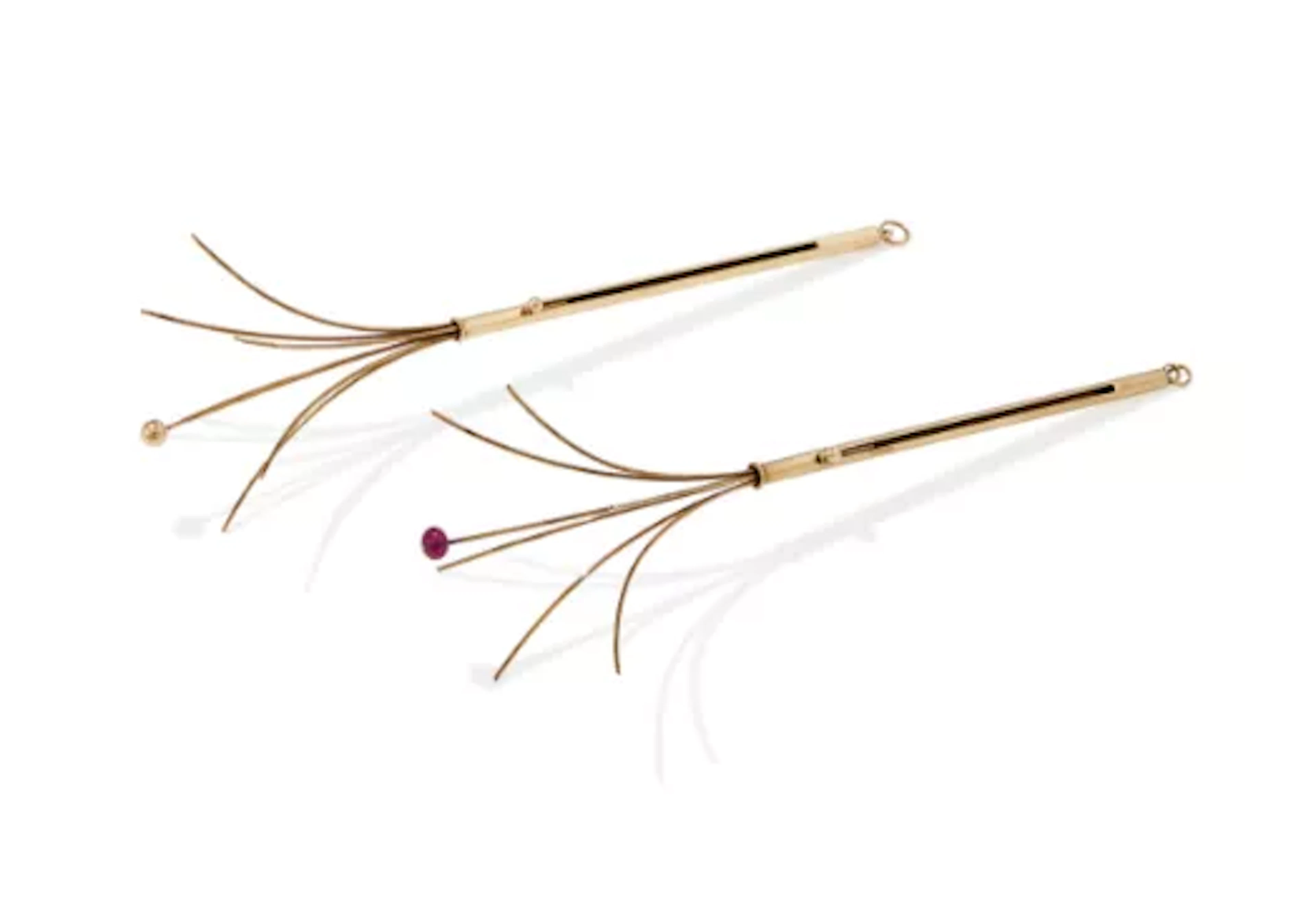 CARTIER, TWO 9 CARAT GOLD SWIZZLE STICKS