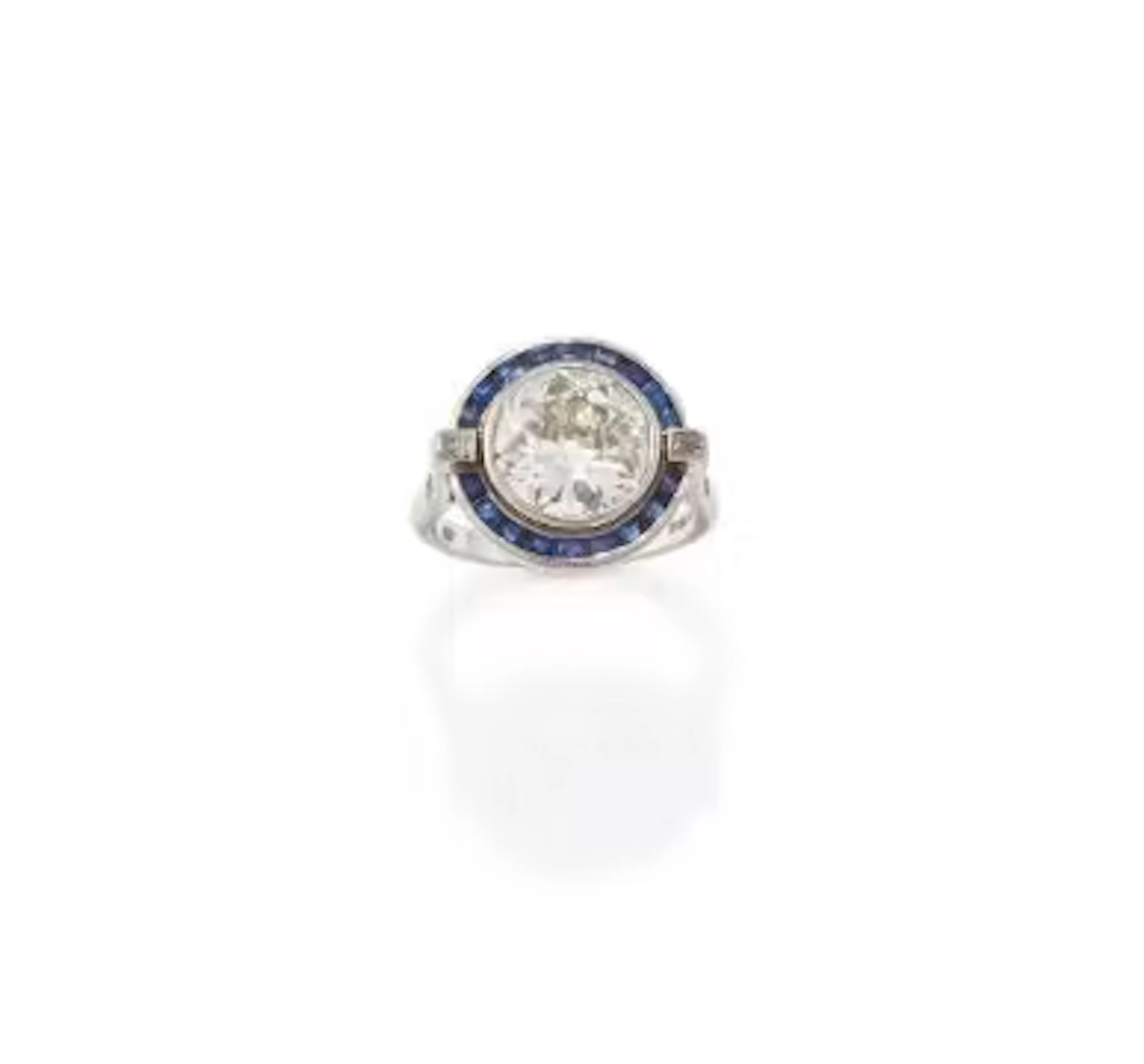 A DIAMOND AND SAPPHIRE RING