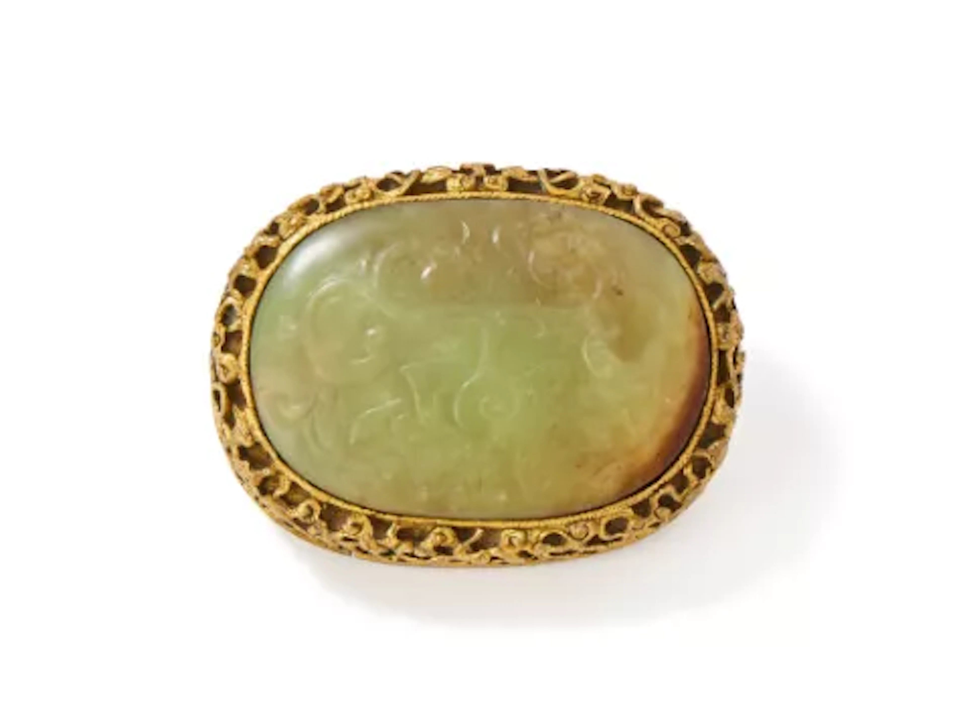A Chinese oval yellow jade, and gilt-bronze belt buckle