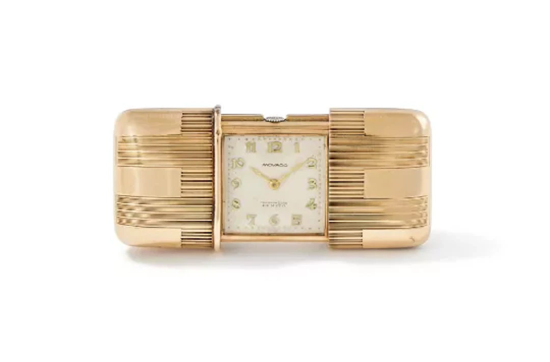 MOVADO, A 9 CARAT GOLD PURSE WATCH