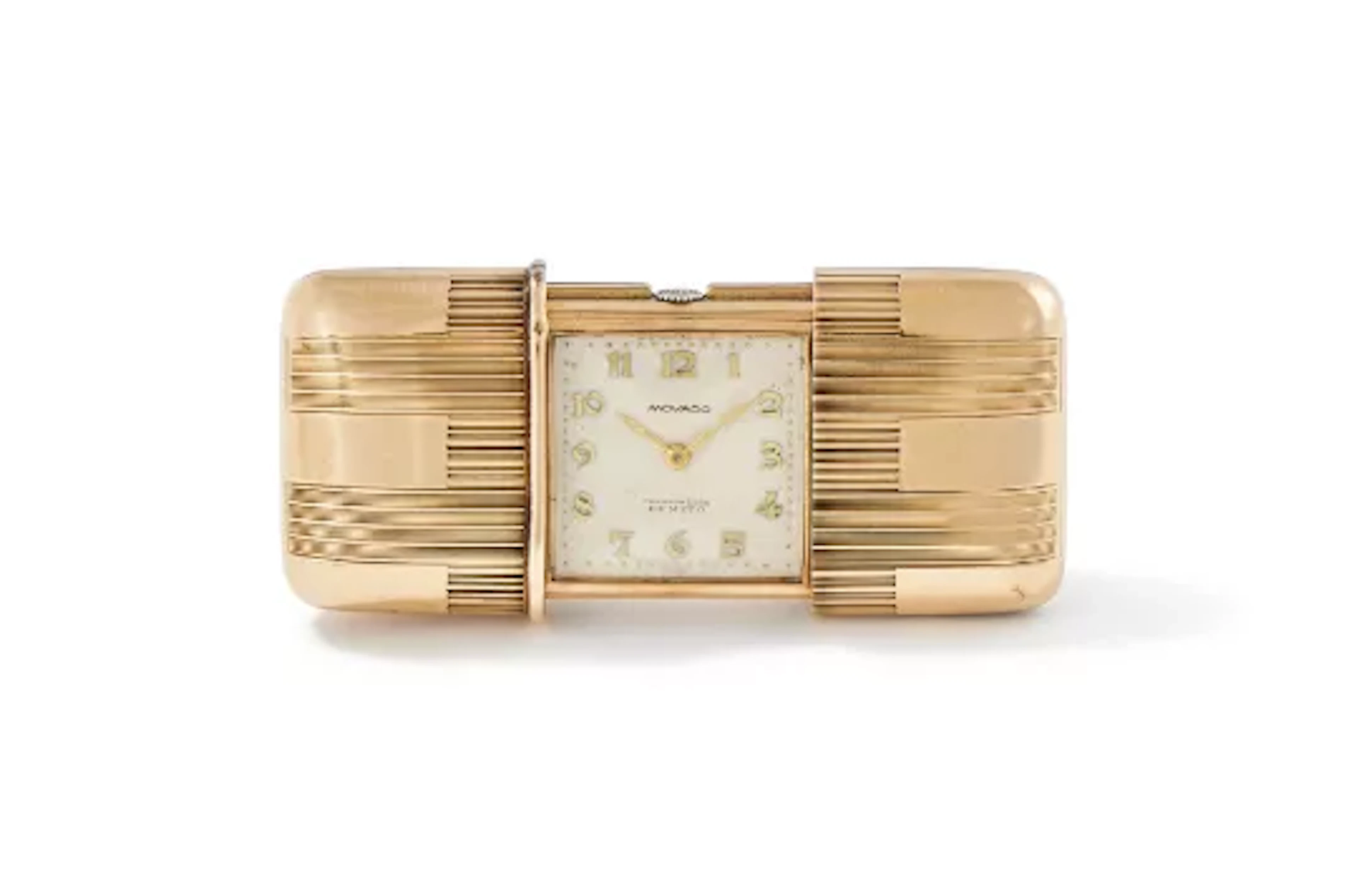 MOVADO, A 9 CARAT GOLD PURSE WATCH