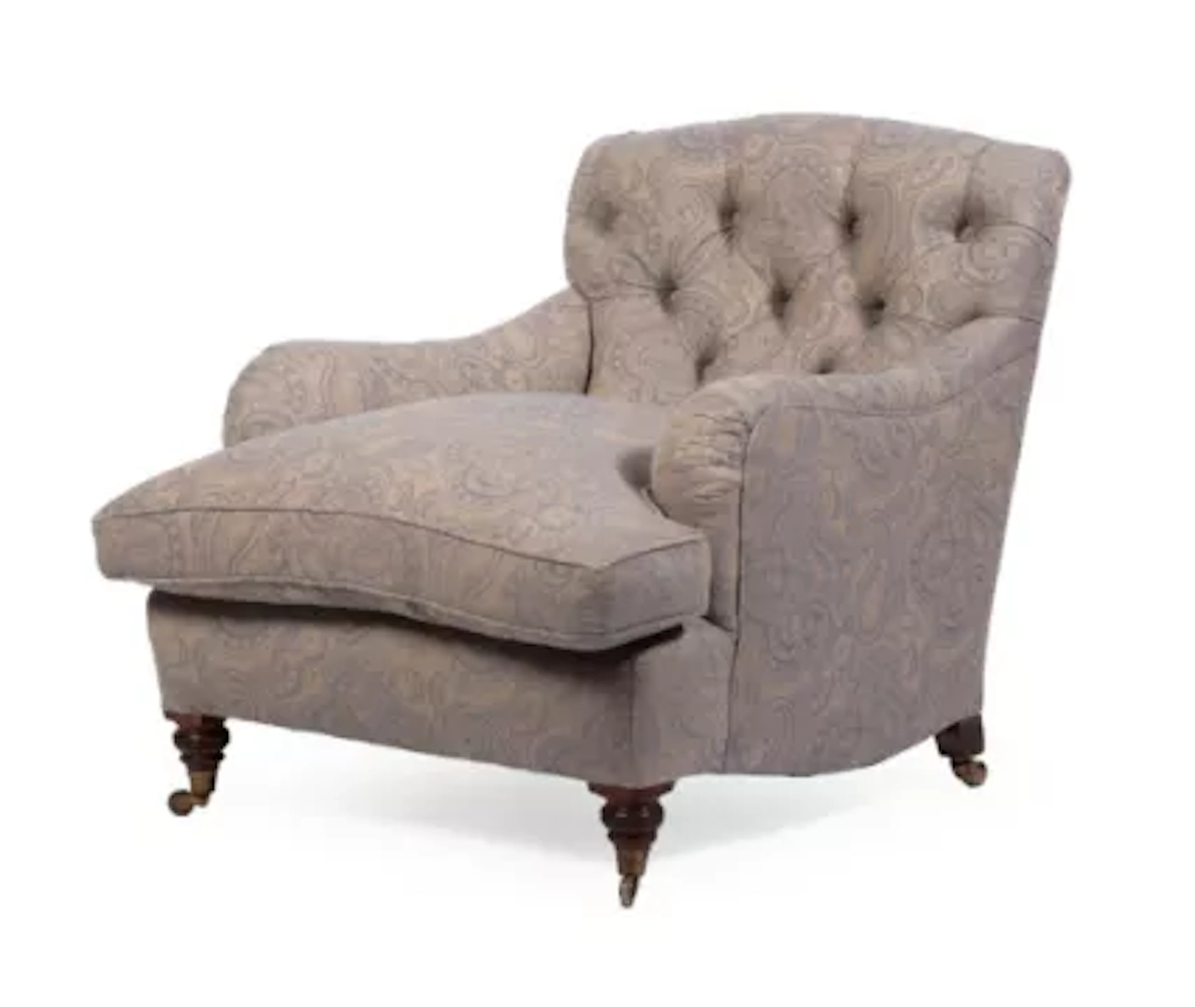 A WALNUT AND UPHOLSTERED LOW ARMCHAIR, CIRCA 1890