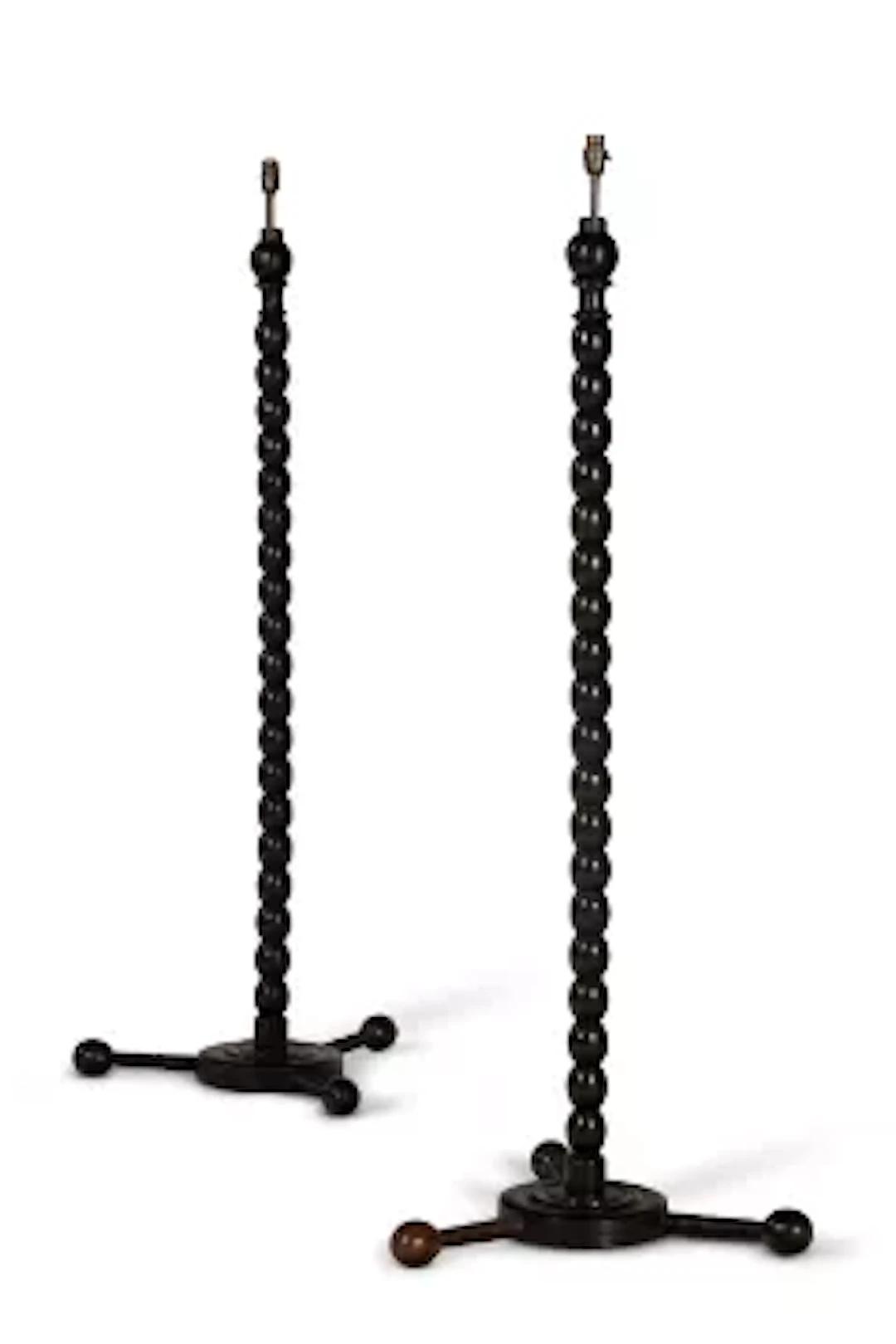 Y A PAIR OF EBONY STANDARD LAMPS, INDIAN, MODERN