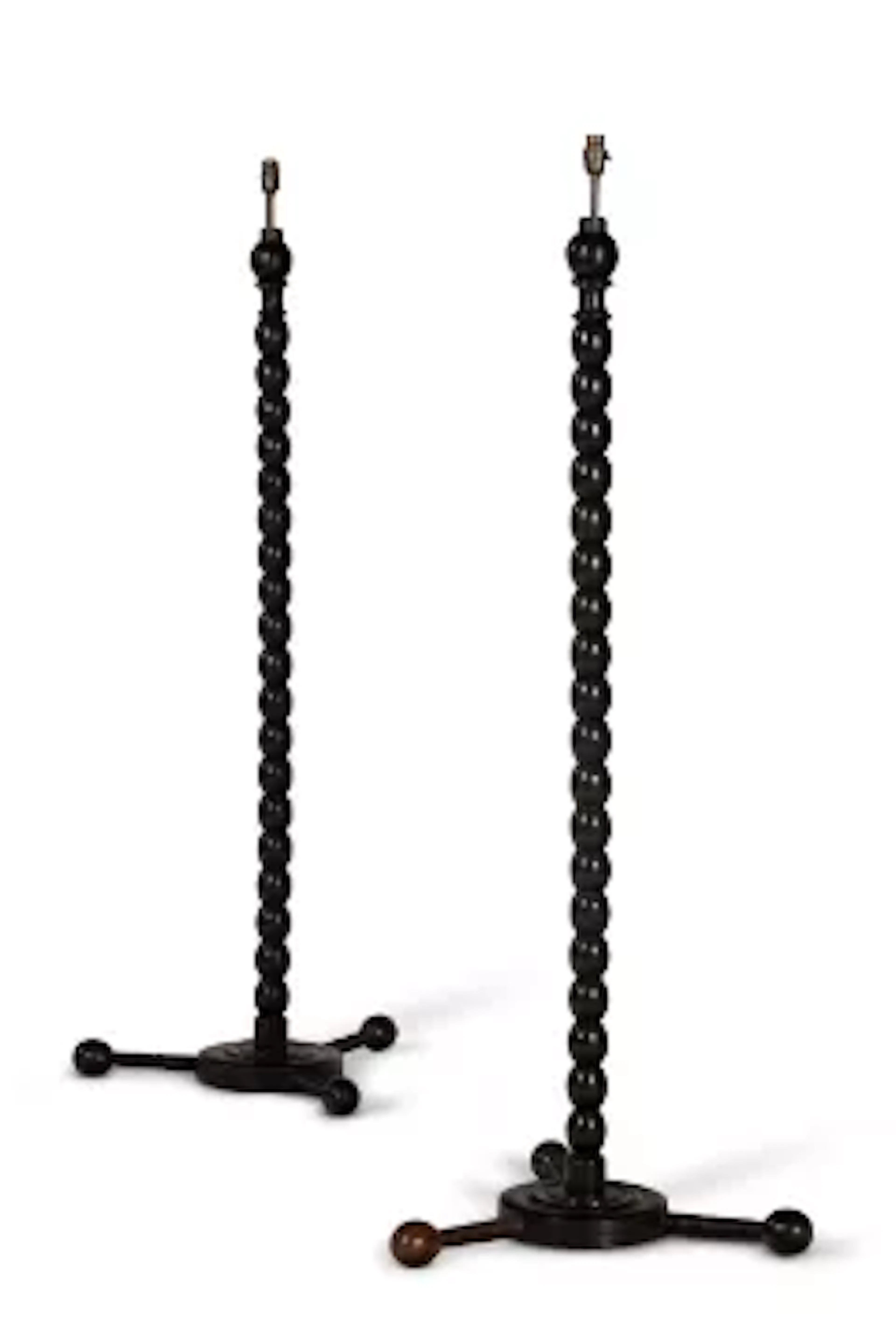 Y A PAIR OF EBONY STANDARD LAMPS, INDIAN, MODERN