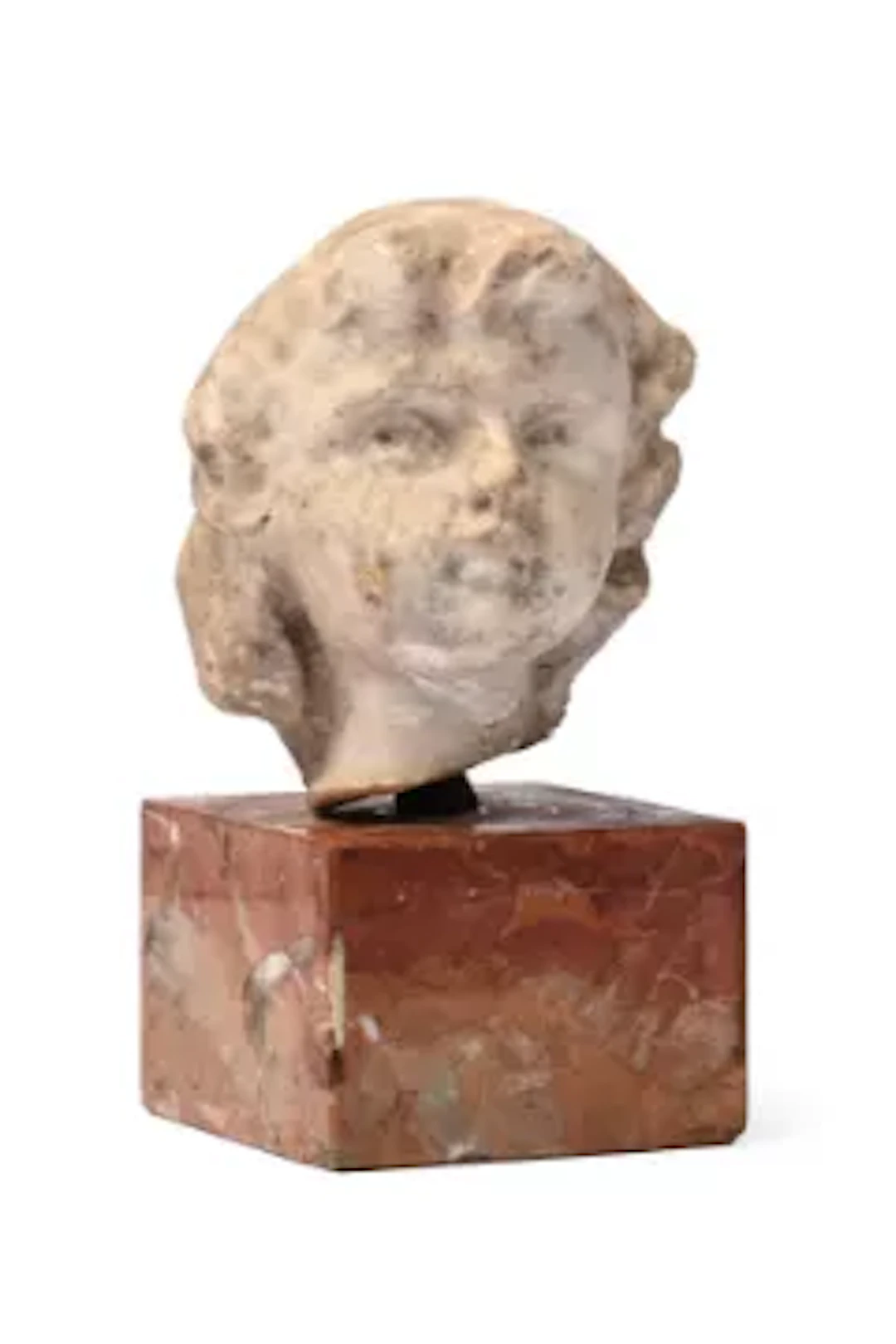 A SMALL MARBLE HEAD OF A BOY, LATE 17TH CENTURY