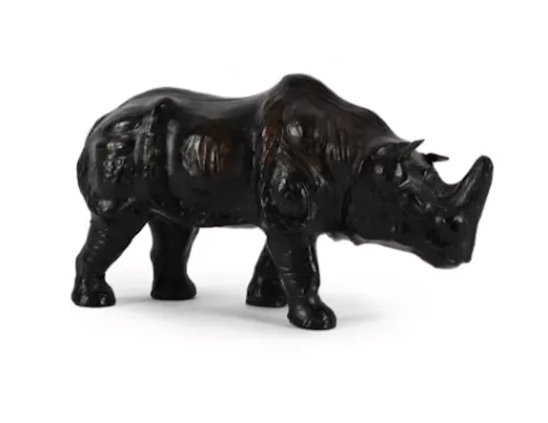 A LEATHER MODEL OF A RHINOCEROS, IN THE MANNER OF OMERSA, 20TH CENTURY