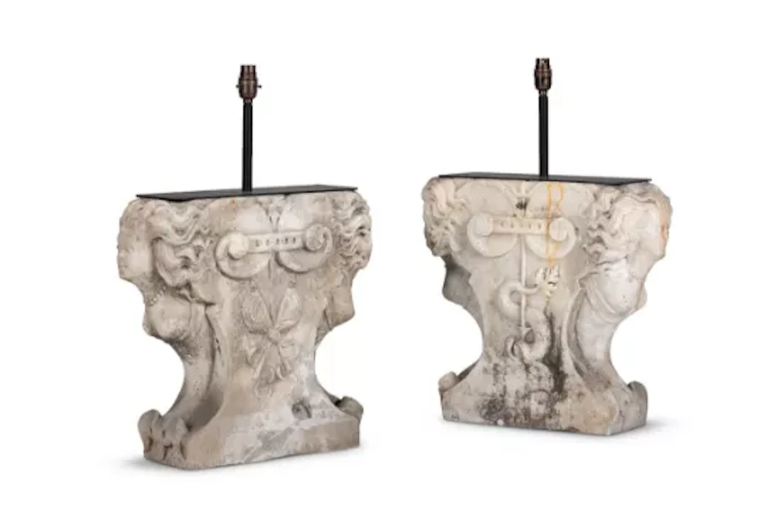 A PAIR OF CARVED ISTRIAN STONE ARCHITECTURAL SUPPORT BASE TABLE LIGHTS