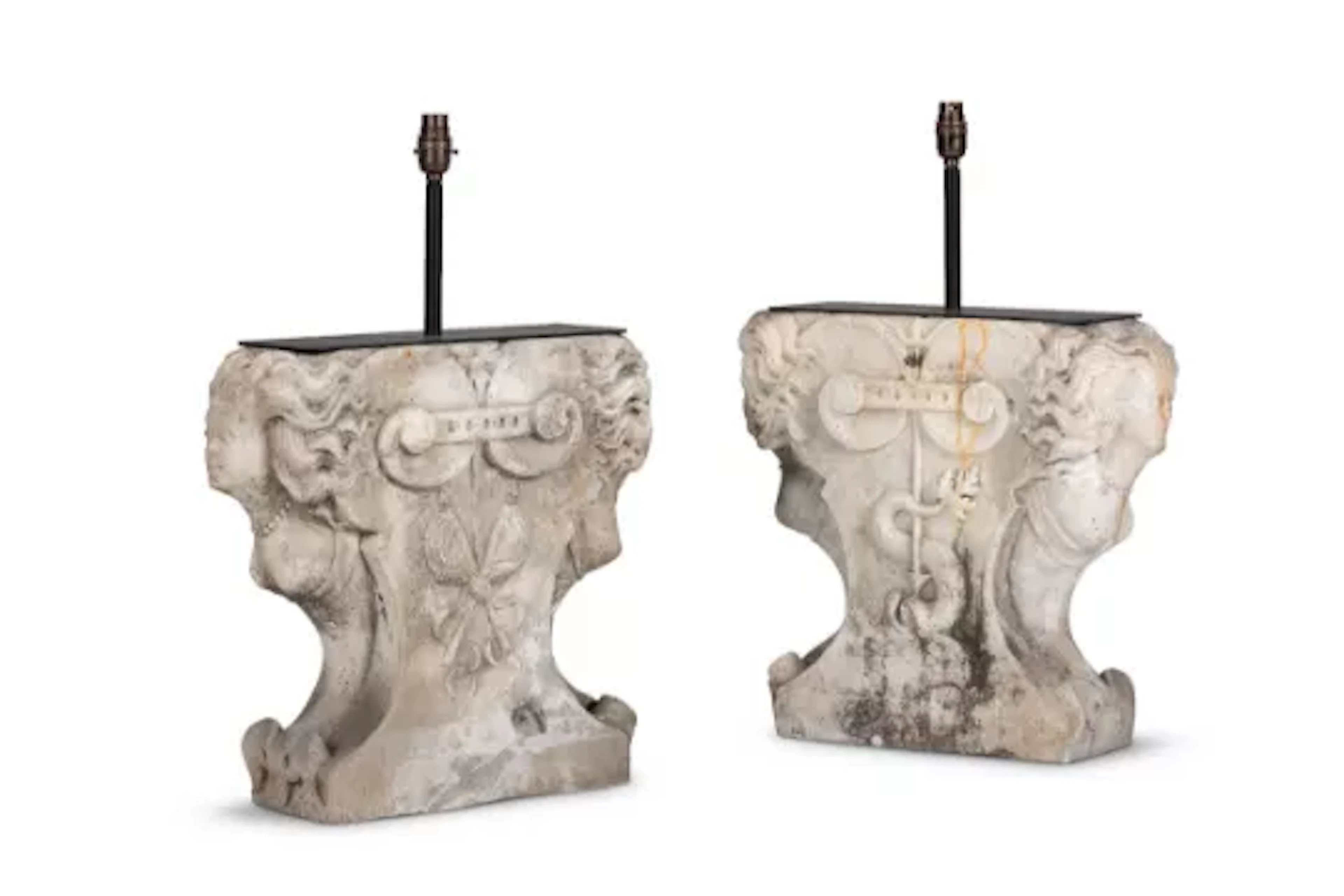 A PAIR OF CARVED ISTRIAN STONE ARCHITECTURAL SUPPORT BASE TABLE LIGHTS
