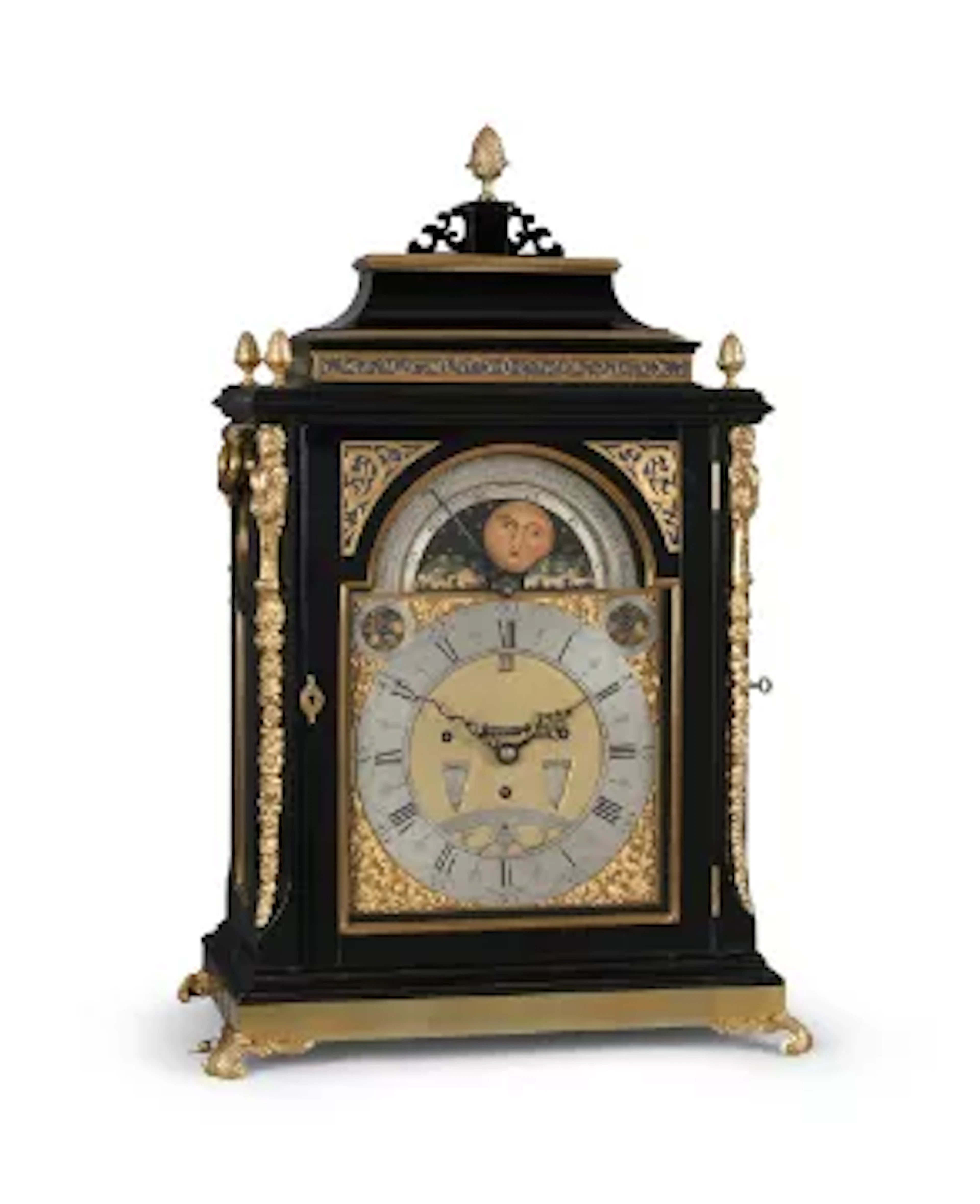 AN IMPRESSIVE GEORGE III EBONISED TWELVE-TUNE MUSICAL TABLE CLOCK