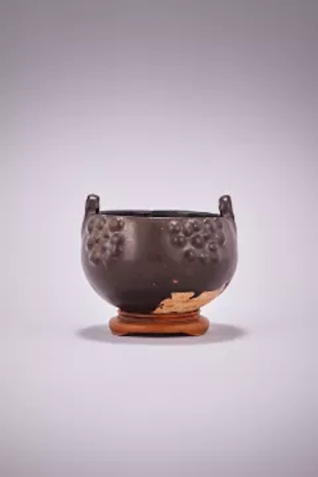 A rare black-glazed twin-handled bowl, Northern China, 13th or 14th century