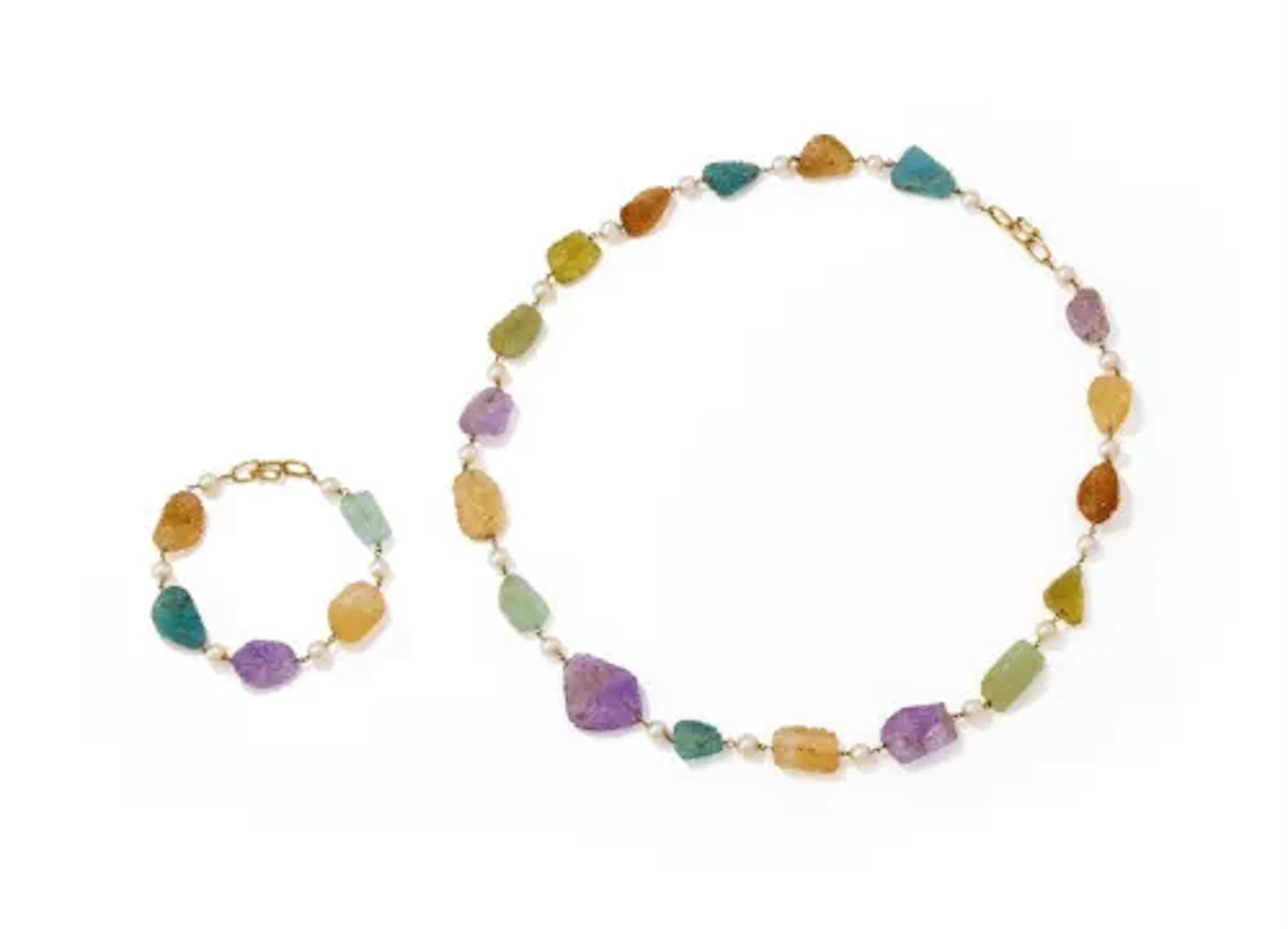 A CARVED GEM AND CULTURED PEARL NECKLACE AND BRACELET