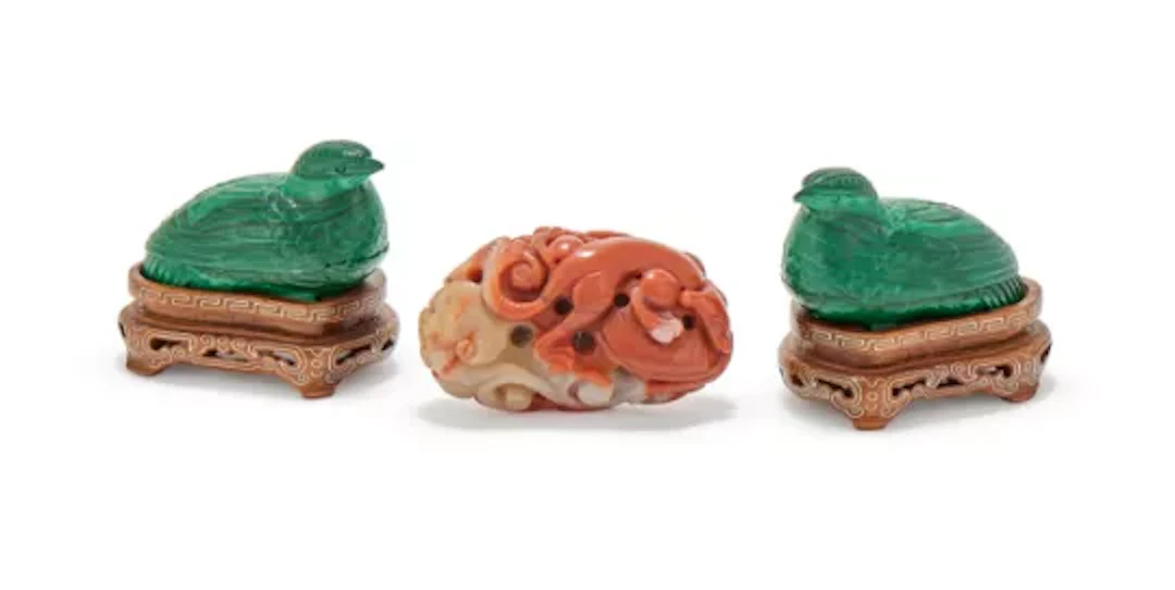 A pair of Chinese malachite miniature birds and covers, 20th century