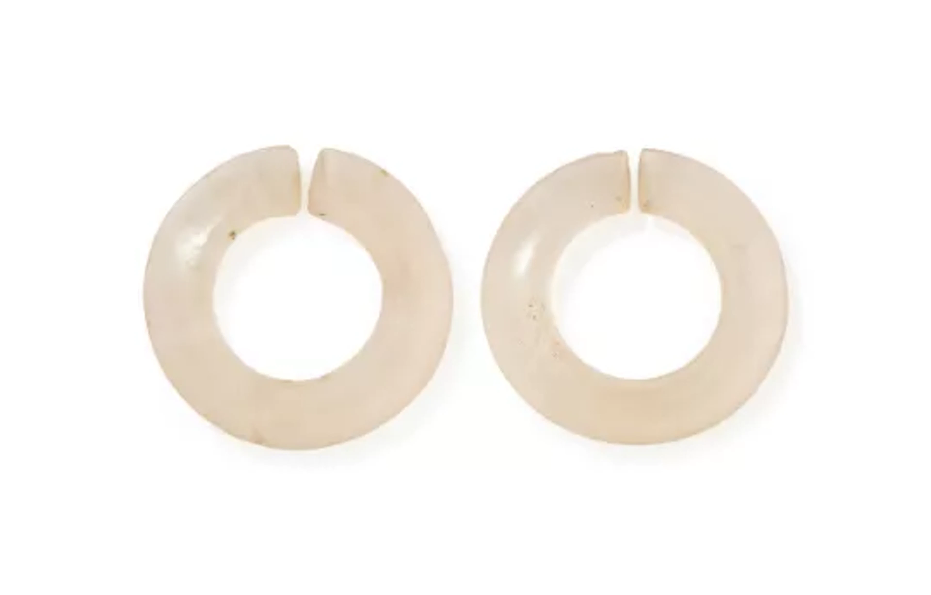 Two Chinese rock crystal jue discs, Xiajiadian culture, circa 2000BC