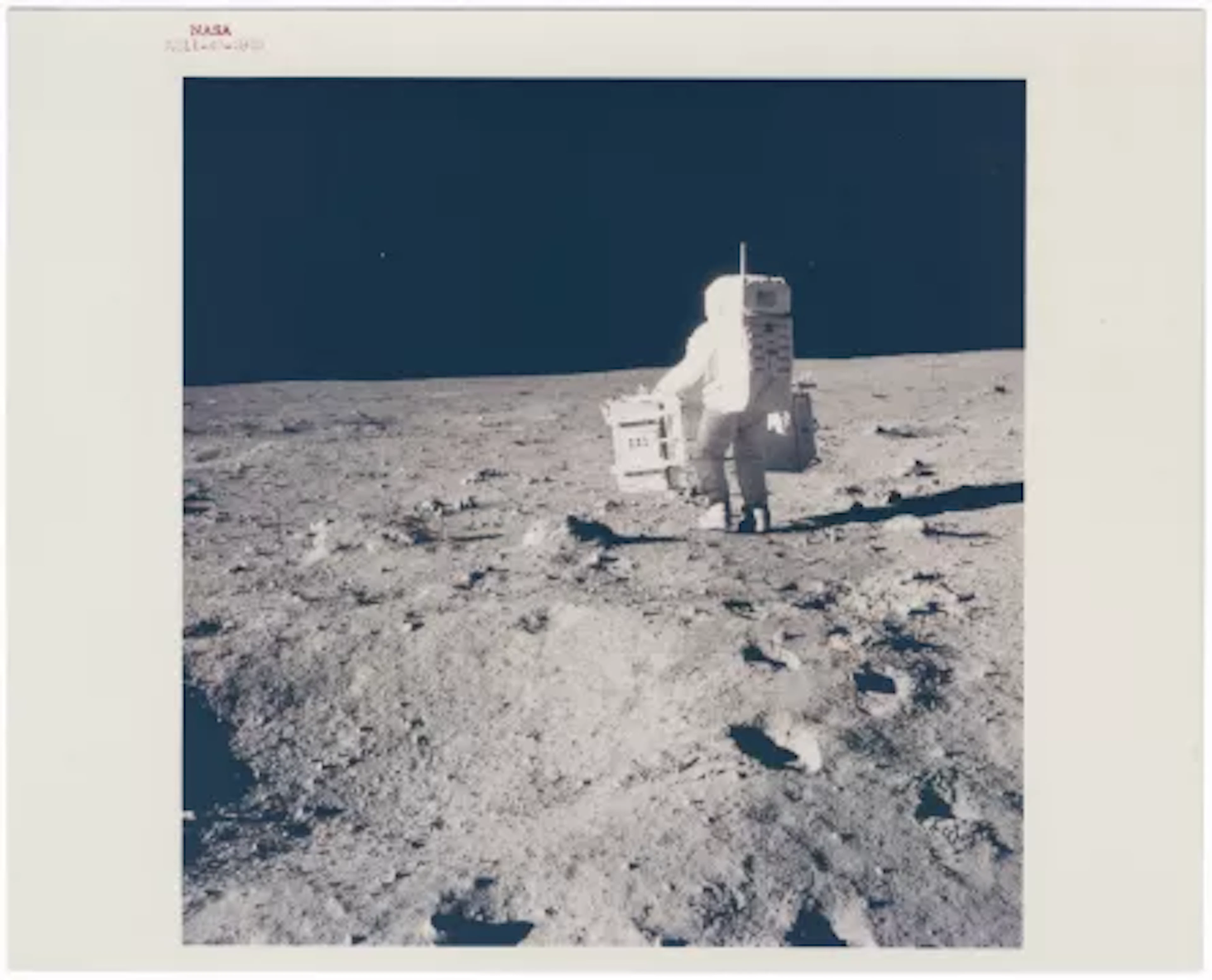 [APOLLO 11] BUZZ ALDRIN STRIDING ACROSS THE SEA OF TRANQUILITY WITH