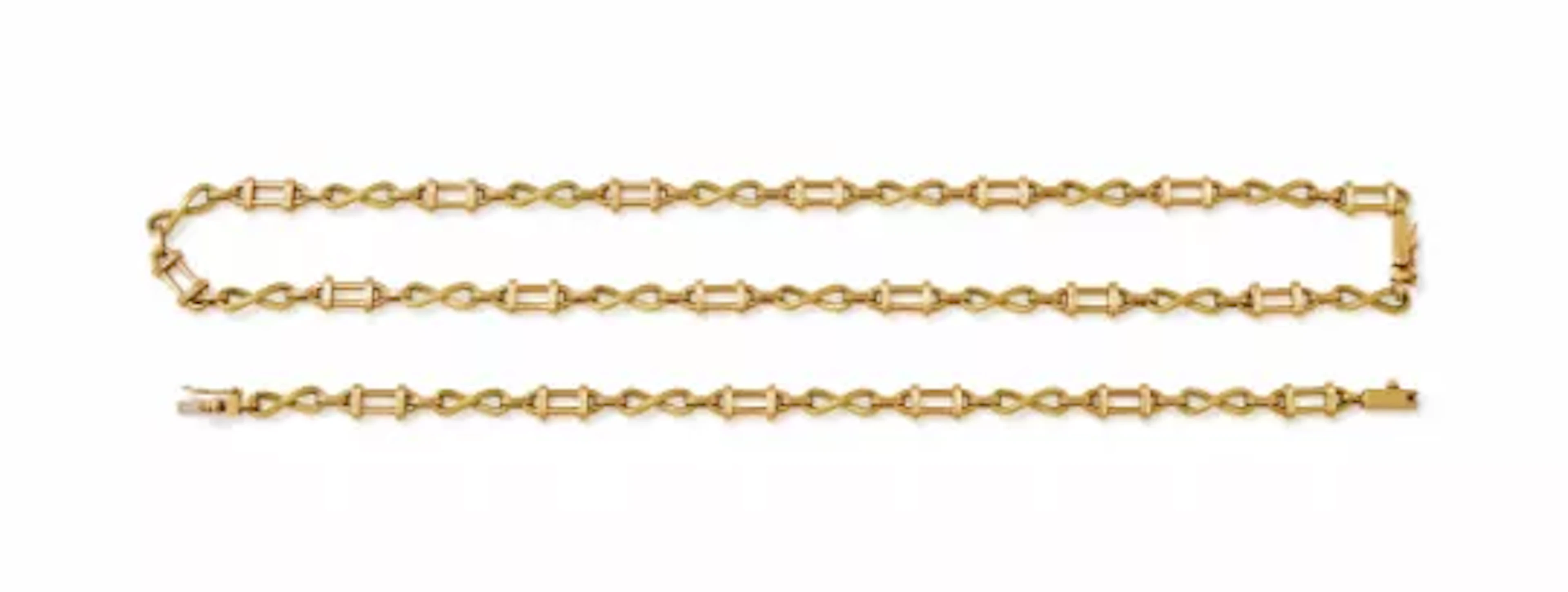 BOODLE & DUNTHORNE, AN 18 CARAT GOLD FANCY LINK NECKLACE AND BRACELET