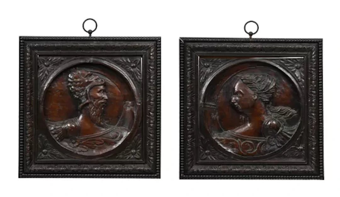 A RARE PAIR OF FRENCH CARVED WALNUT 'MYTHOLOGICAL ROMAYNE' PANELS