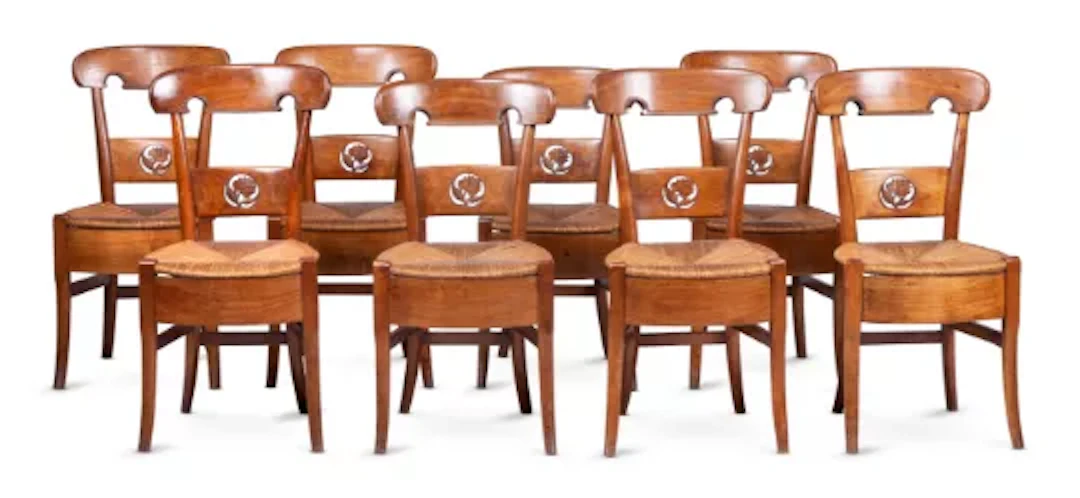 A SET OF EIGHT WALNUT 'CHAISE PAILEE' FARMHOUSE CHAIRS, SWISS OR FRENCH
