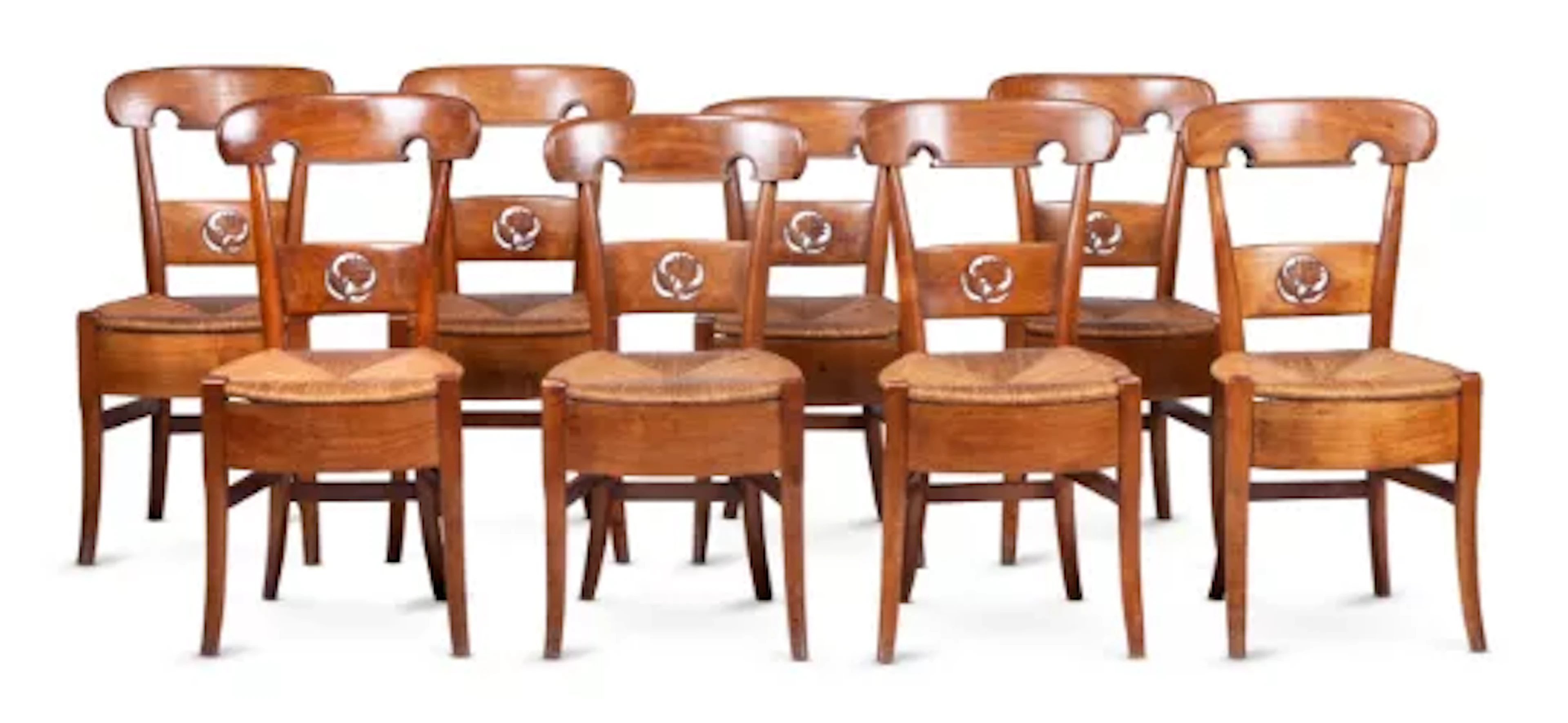 A SET OF EIGHT WALNUT 'CHAISE PAILEE' FARMHOUSE CHAIRS, SWISS OR FRENCH