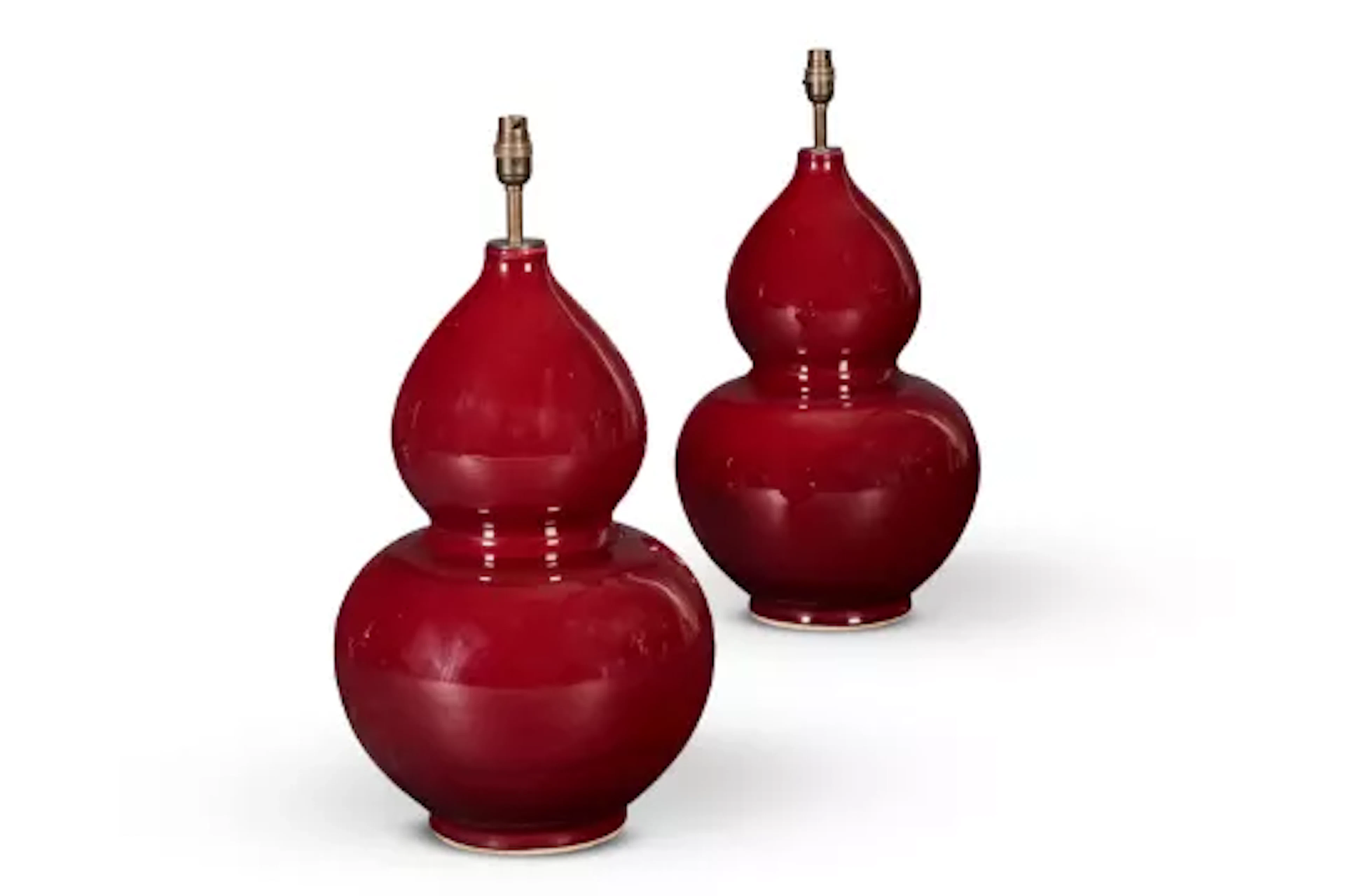 A PAIR OF CHINESE SANG DE BOEUF VASE TABLE LAMPS, LATE 20TH CENTURY