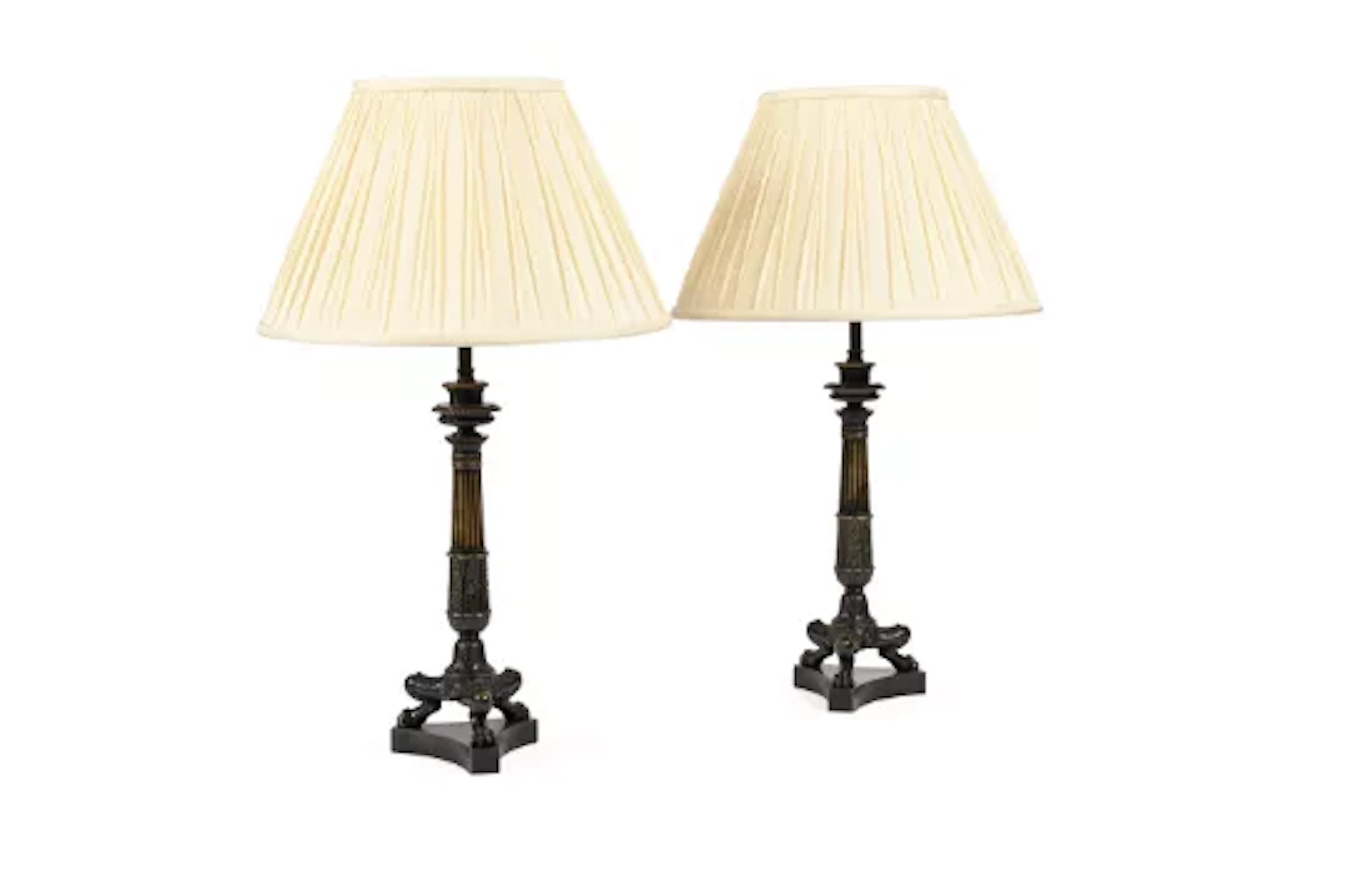 A PAIR OF BRONZE TRIFORM TABLE LIGHTS, EARLY 19TH CENTURY
