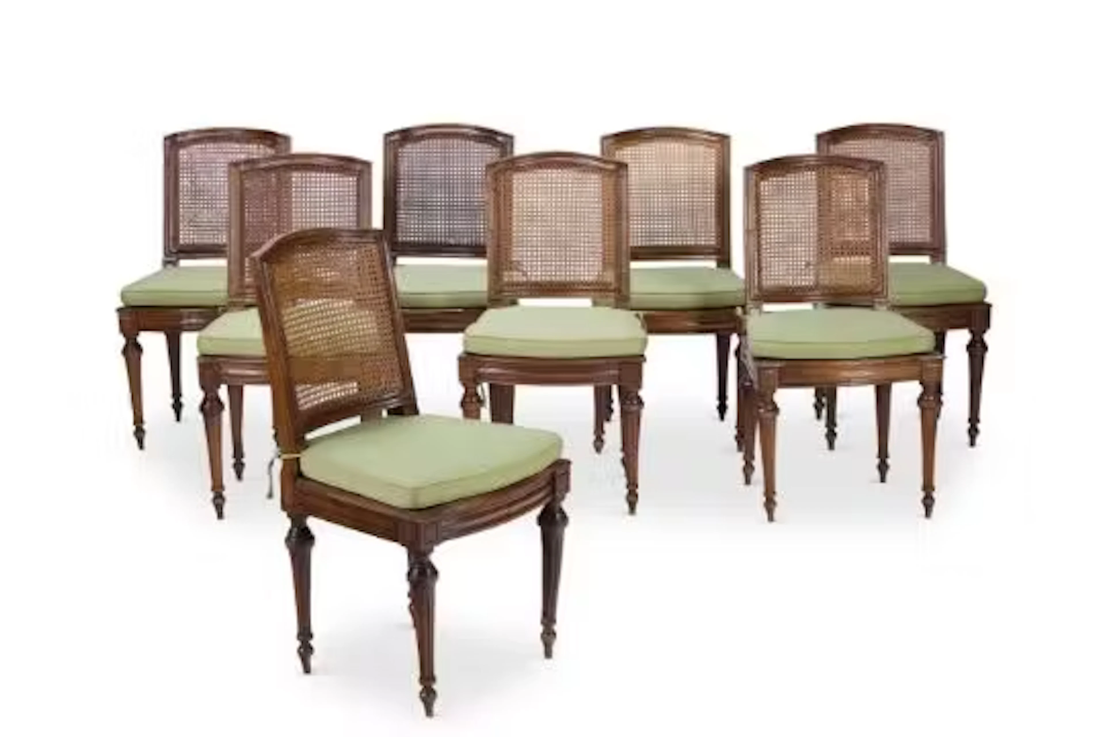 A SET OF EIGHT LOUIS XVI BEECH AND CANNED DINING CHAIRS