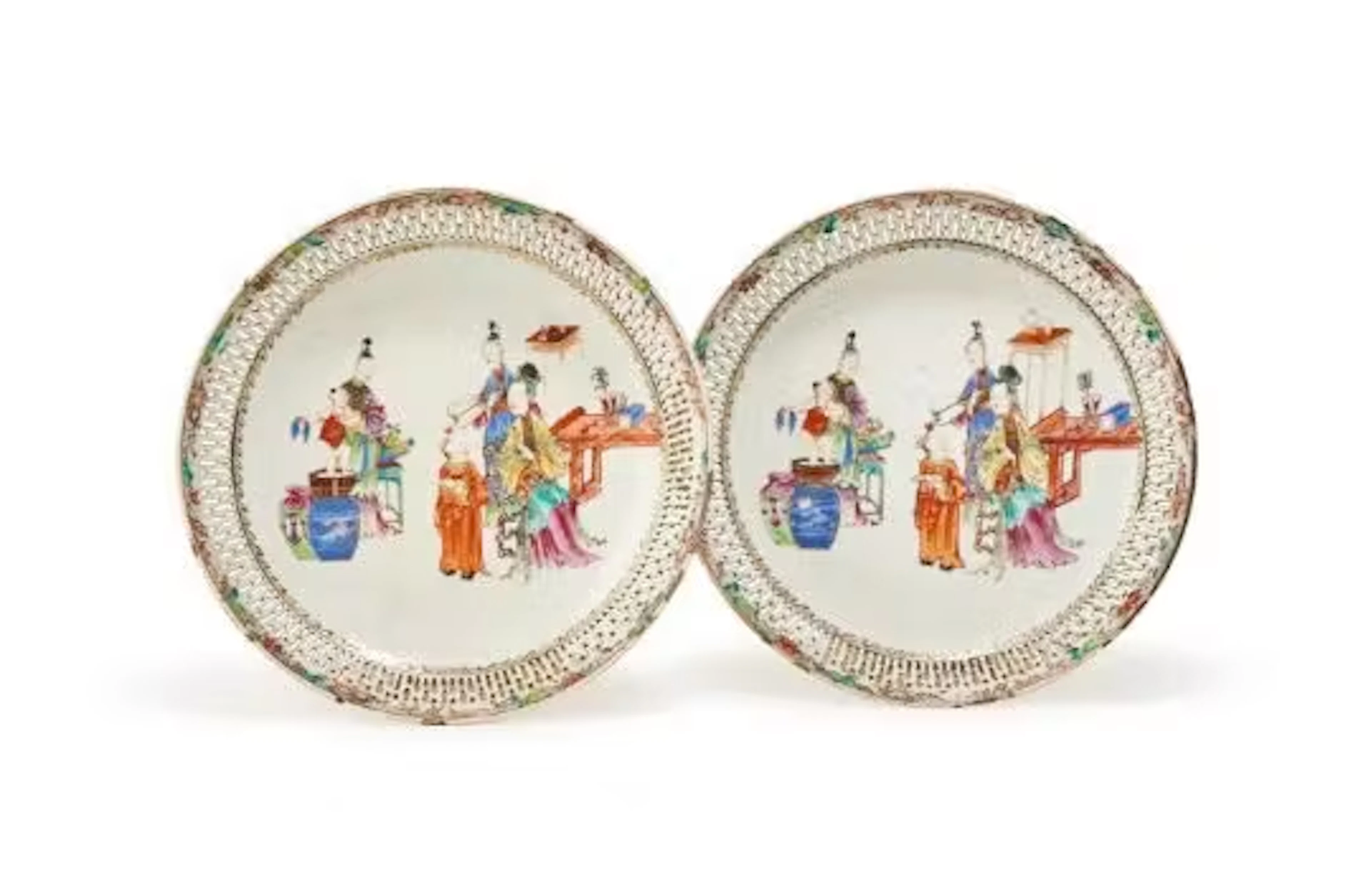 A pair of Chinese porcelain Famille Rose plates